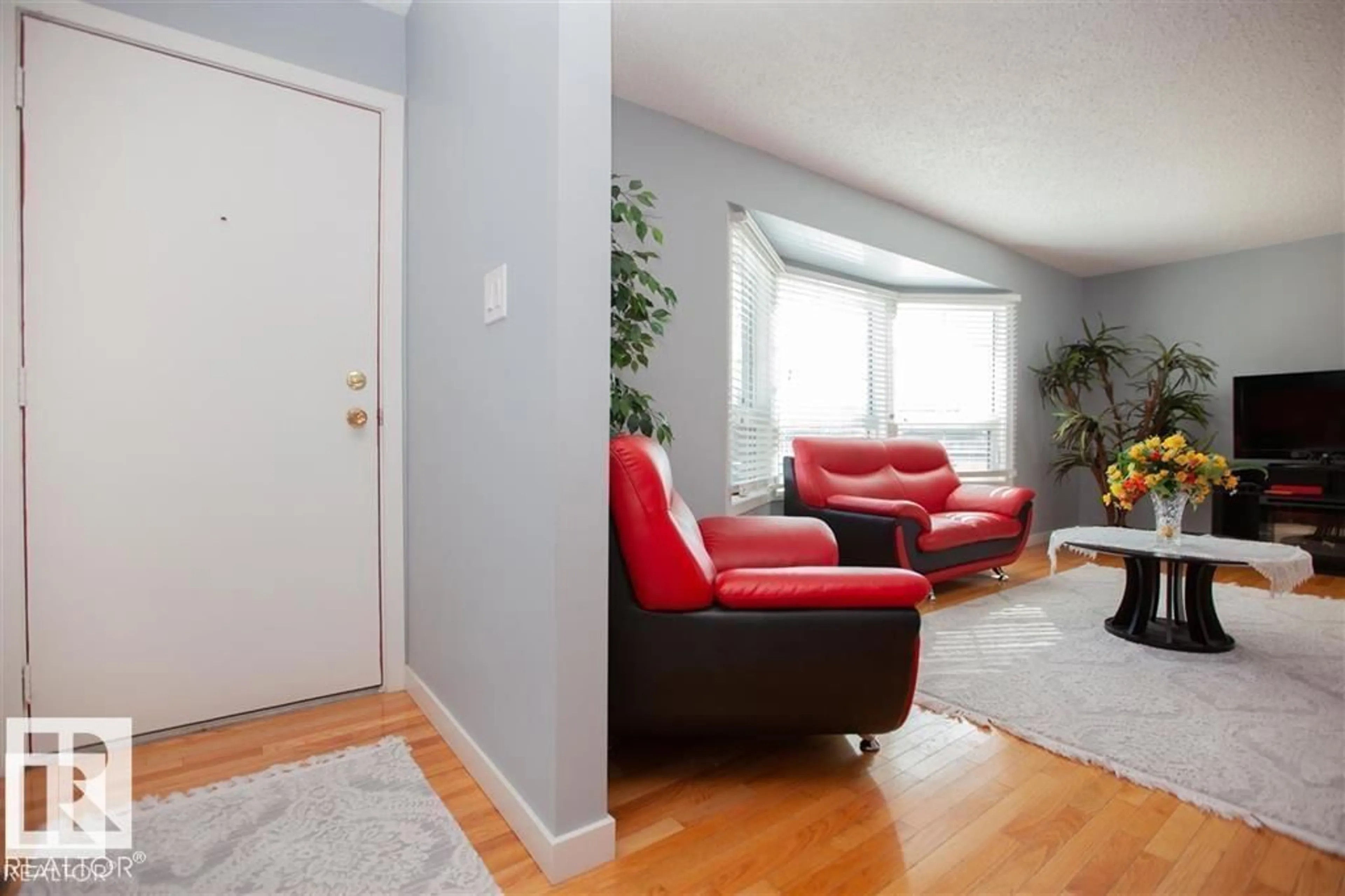 Living room with furniture, unknown for 17208 106 ST, Edmonton Alberta T5X3G8