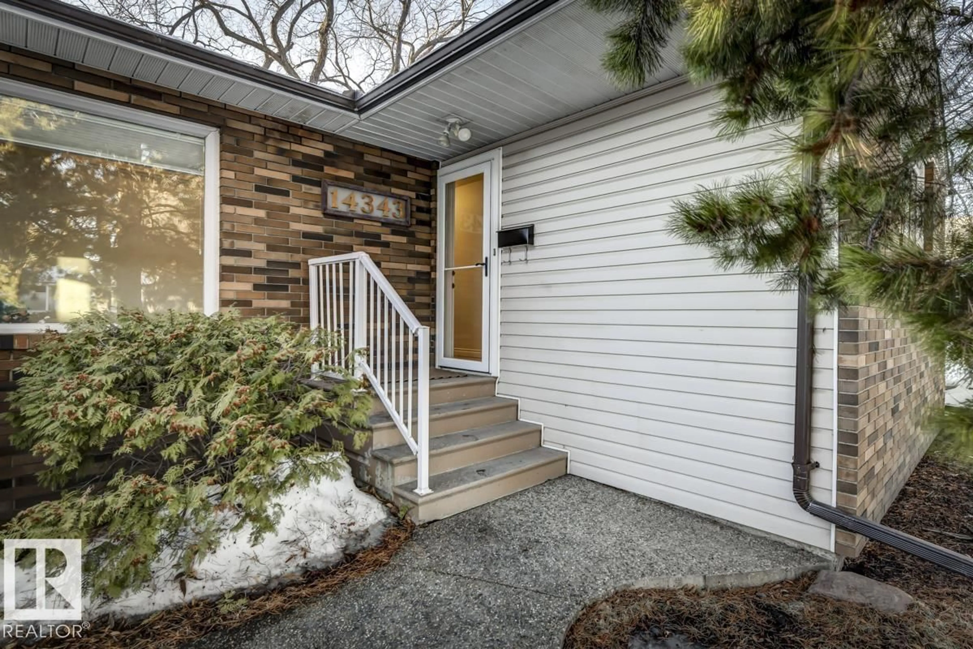 Home with brick exterior material, street for 14343 92A AV, Edmonton Alberta T5R5E3