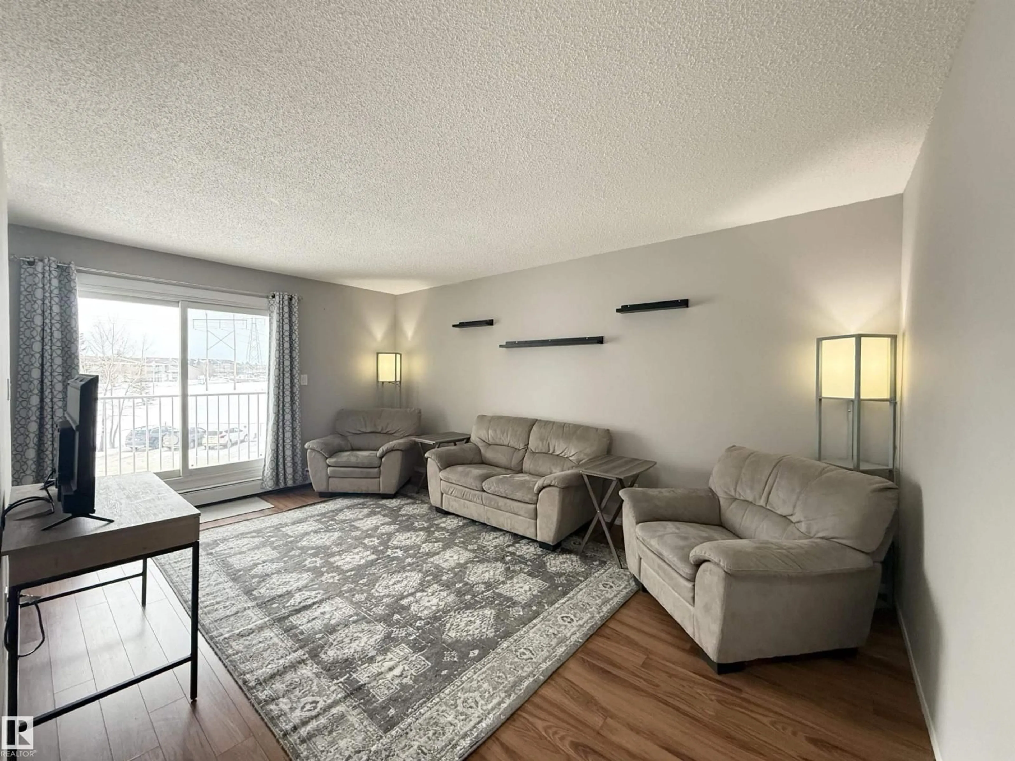 Living room with furniture, unknown for 44 11265 31 AV, Edmonton Alberta T6J3V7