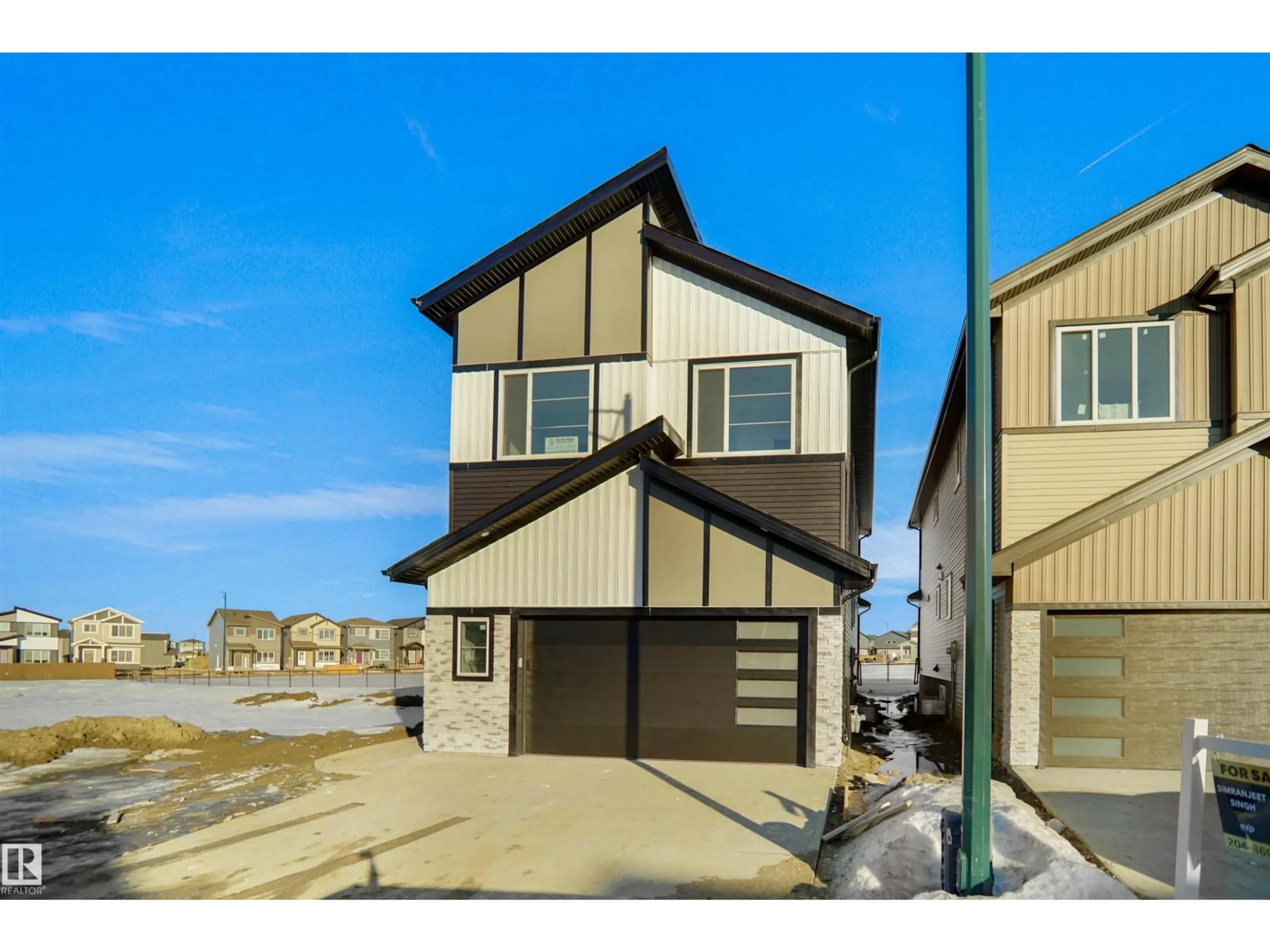 Home with vinyl exterior material, street for SW - 6228 29 AV, Edmonton Alberta T6X3J2