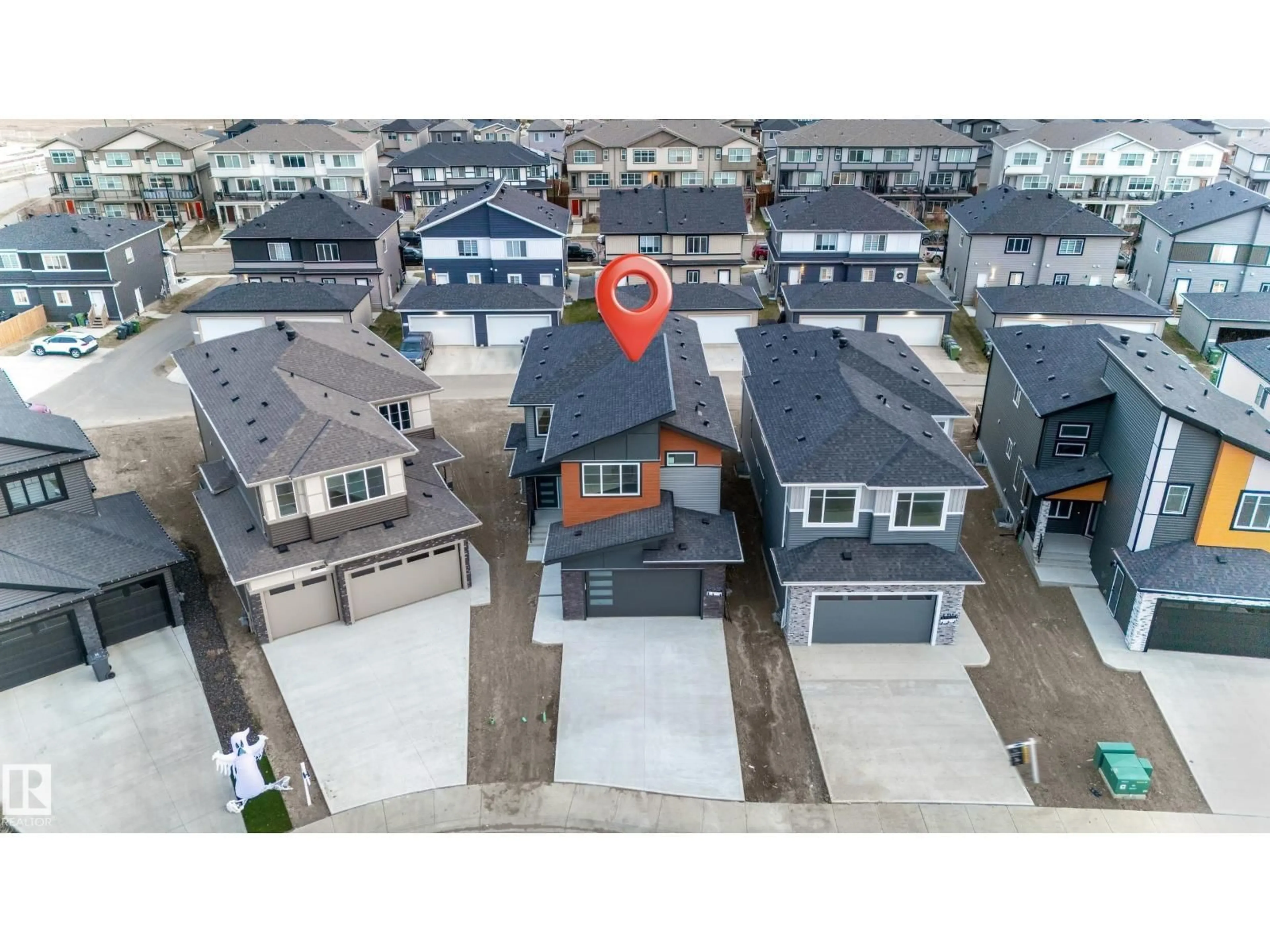 A pic from outside/outdoor area/front of a property/back of a property/a pic from drone, street for 125 LILAC CL, Leduc Alberta T9E1R3