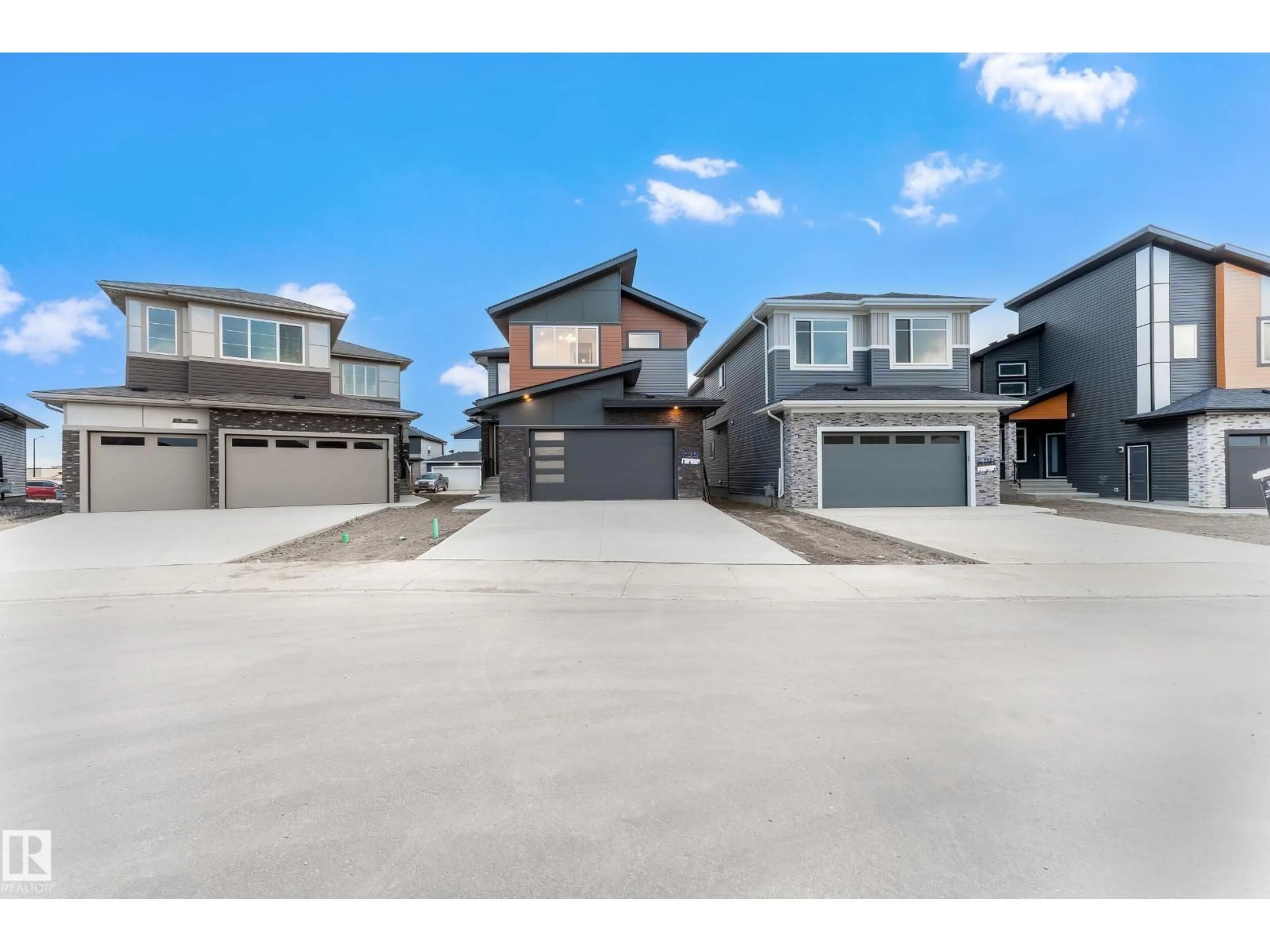 A pic from outside/outdoor area/front of a property/back of a property/a pic from drone, street for 125 LILAC CL, Leduc Alberta T9E1R3