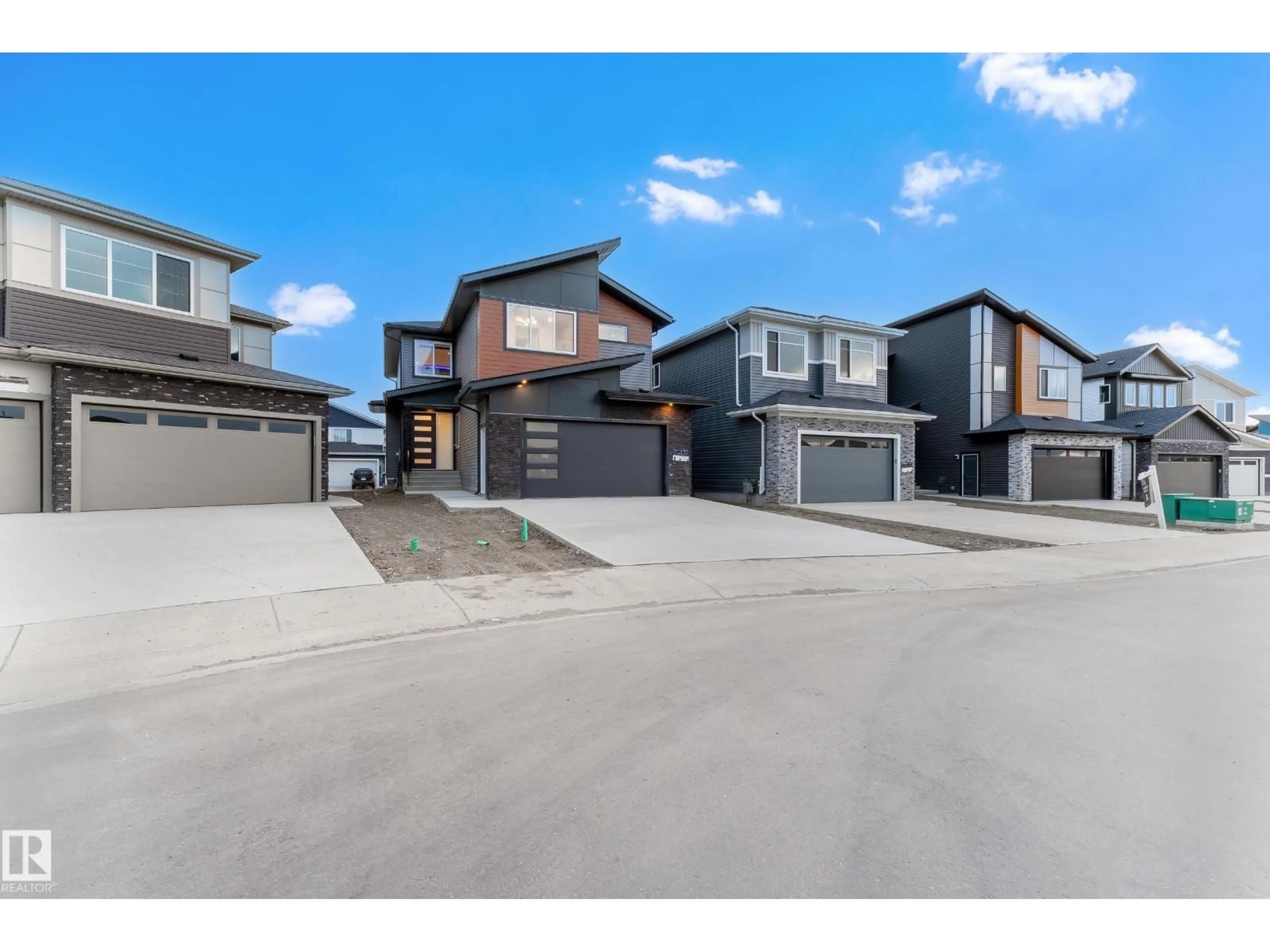 A pic from outside/outdoor area/front of a property/back of a property/a pic from drone, street for 125 LILAC CL, Leduc Alberta T9E1R3