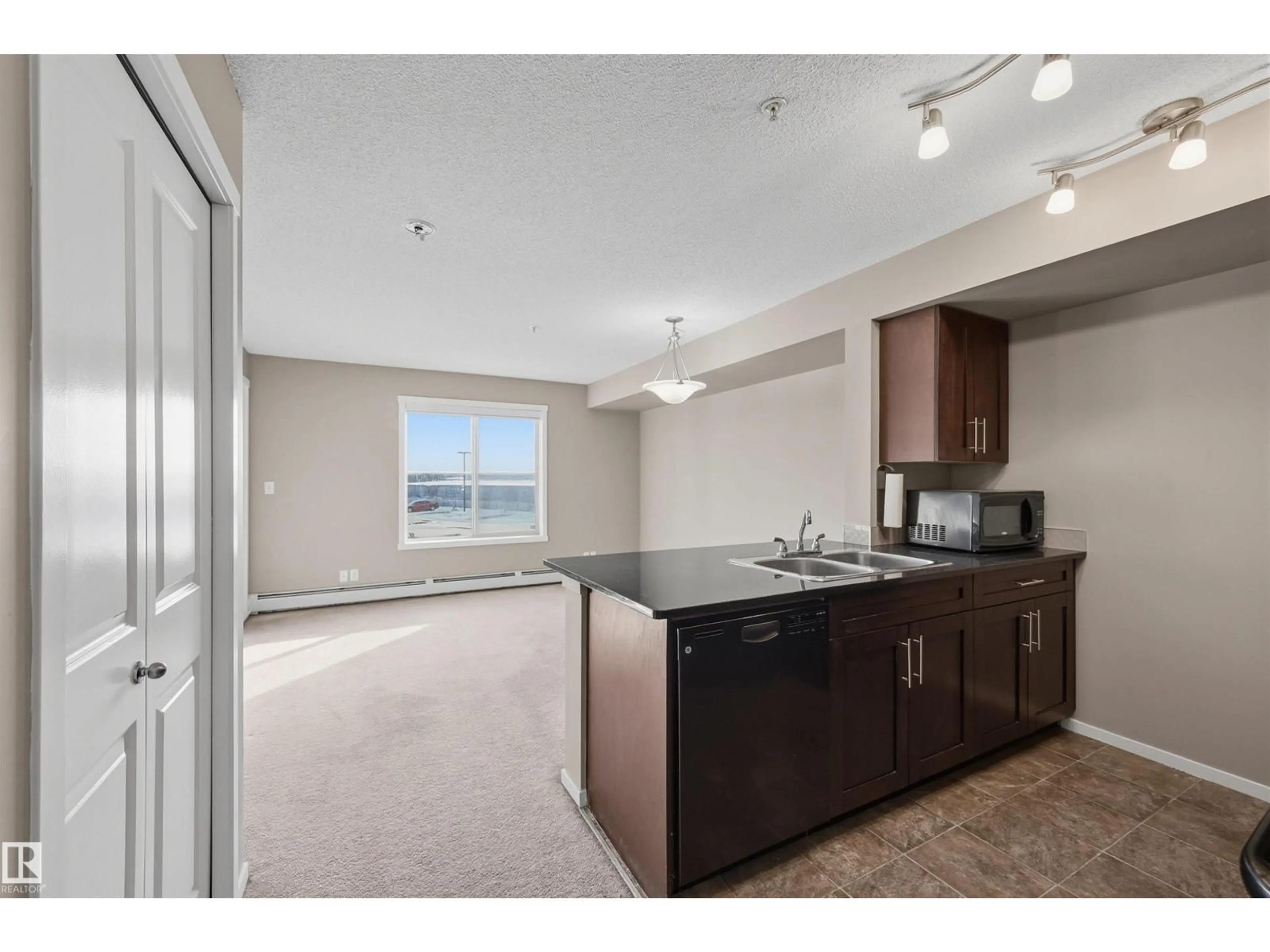 Standard kitchen, unknown for #208 - 5810 MULLEN PL, Edmonton Alberta T6R0W3