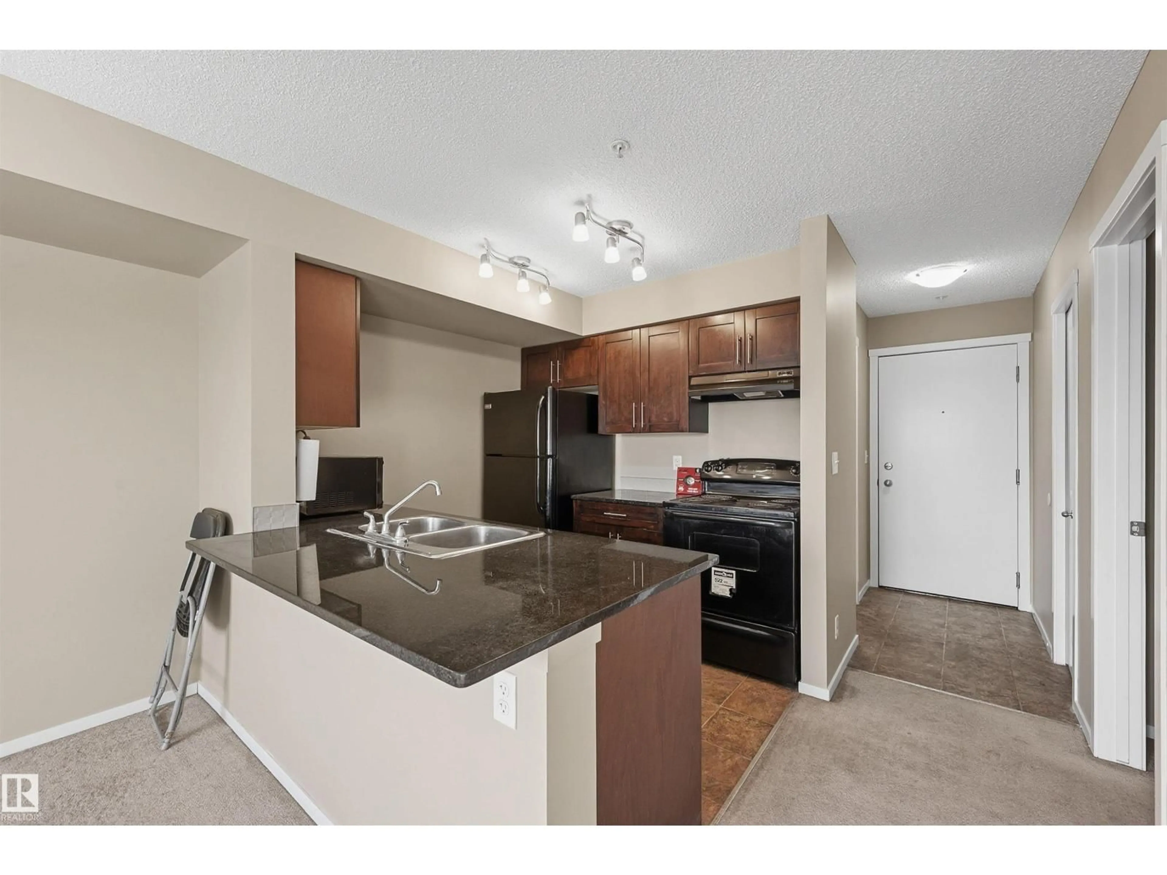 Standard kitchen, unknown for #208 - 5810 MULLEN PL, Edmonton Alberta T6R0W3