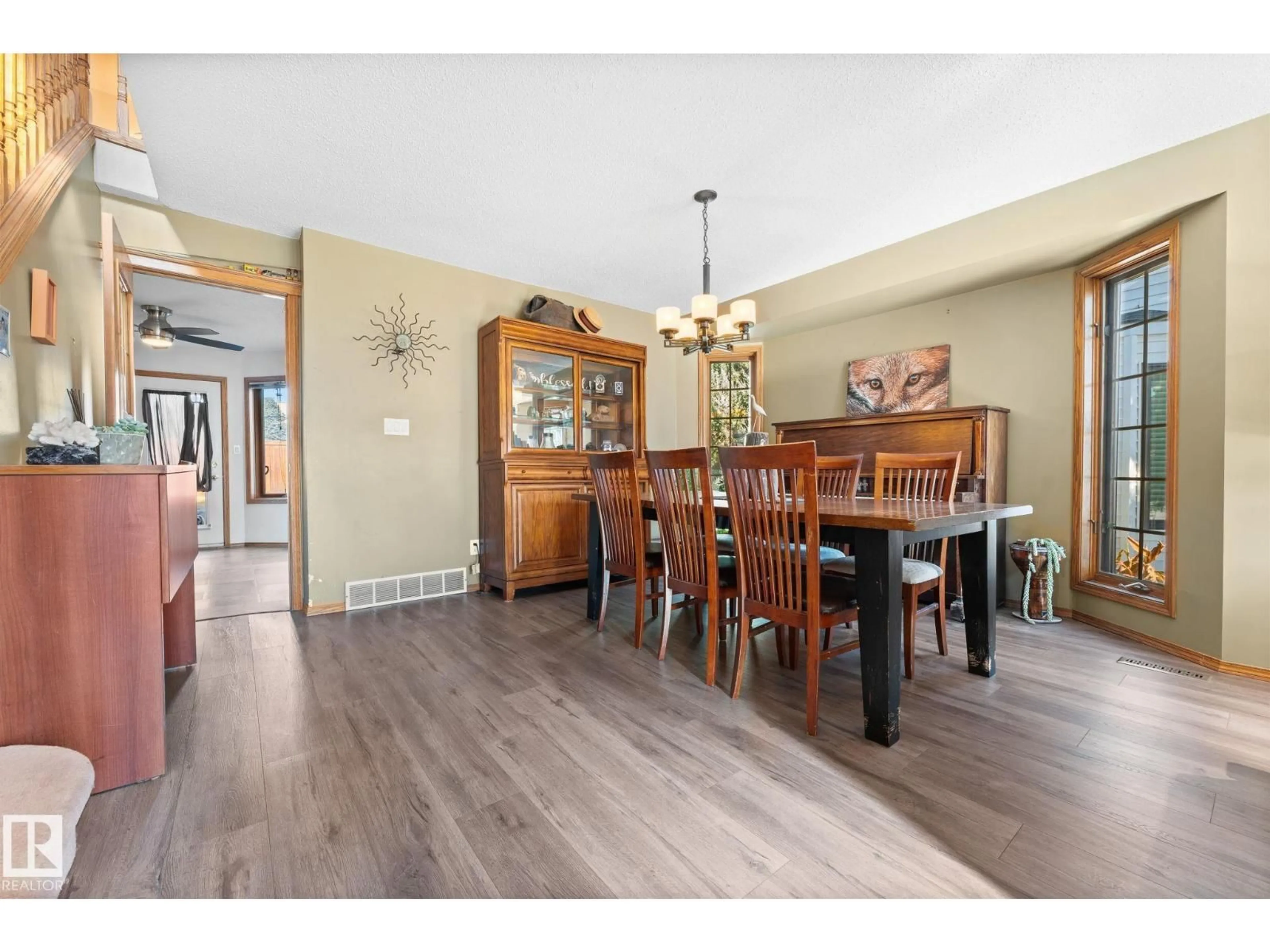 Dining room, wood/laminate floor for 6018 156 AV, Edmonton Alberta T5Y2M8