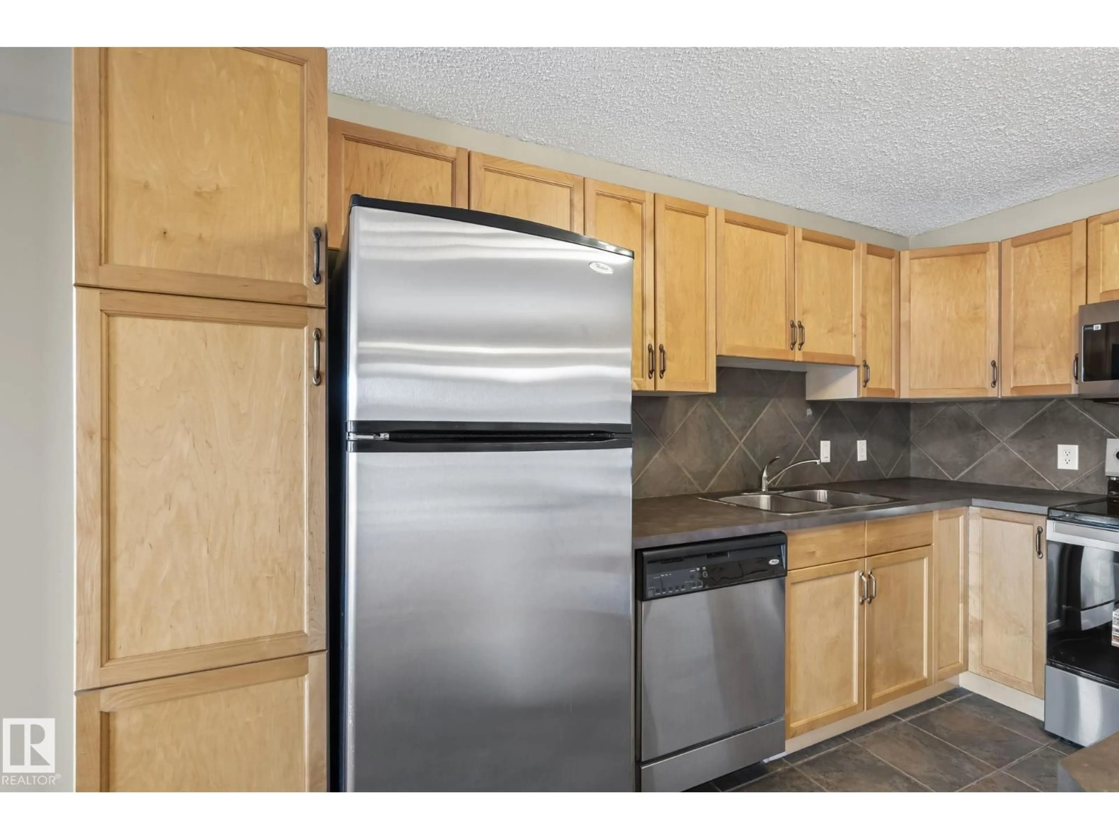 Standard kitchen, wood/laminate floor for #408 - 2098 BLACKMUD CREEK DR, Edmonton Alberta T6W1T7