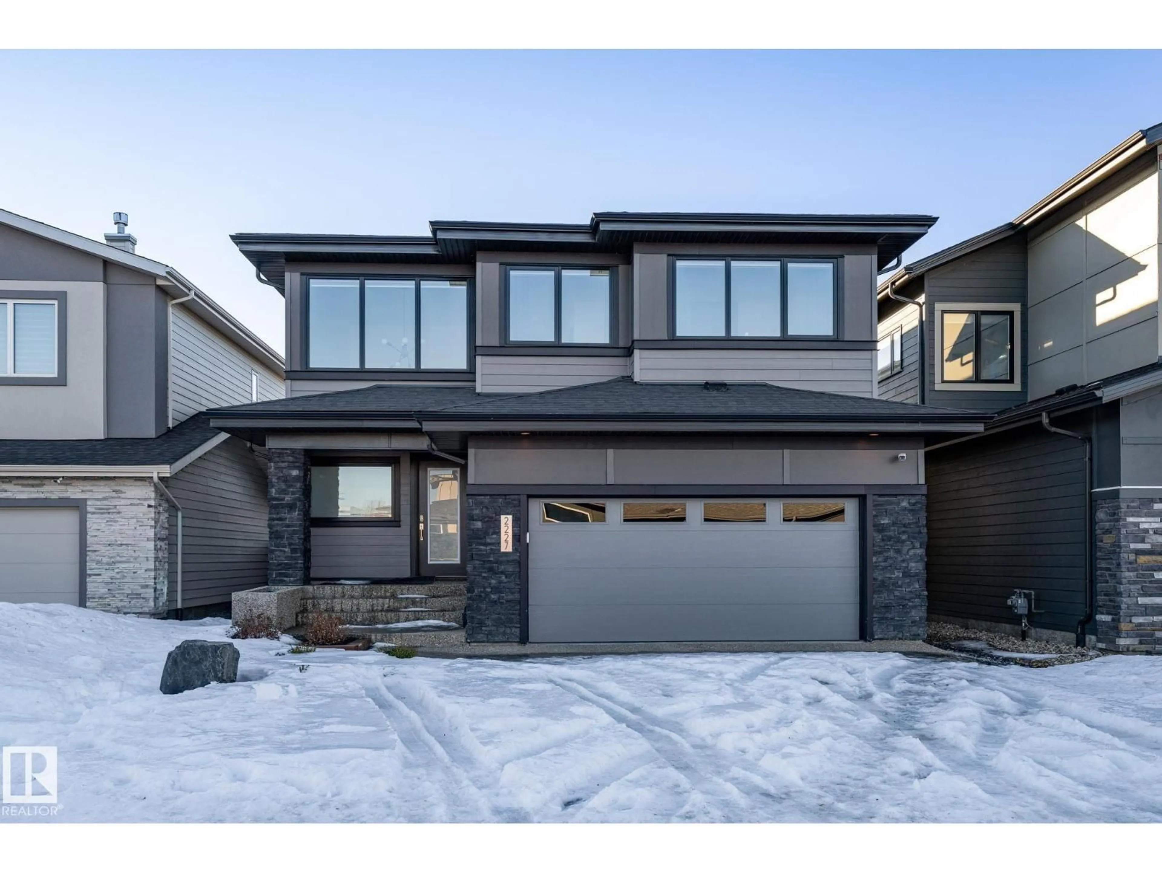 Home with brick exterior material, street for 2227 KELLY CR, Edmonton Alberta T6W3R8