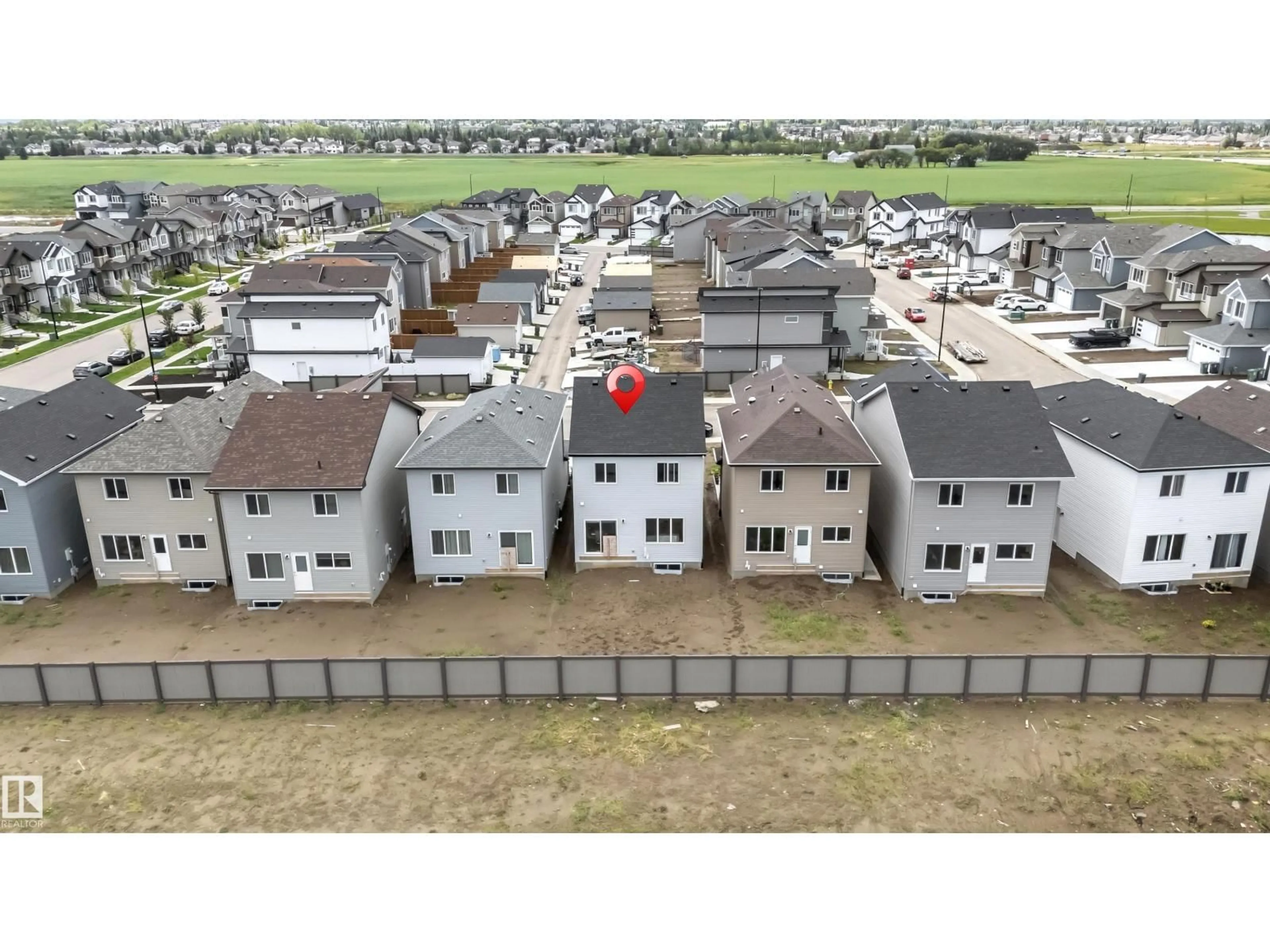 A pic from outside/outdoor area/front of a property/back of a property/a pic from drone, unknown for 4610 72 AV, Beaumont Alberta T4X3B1