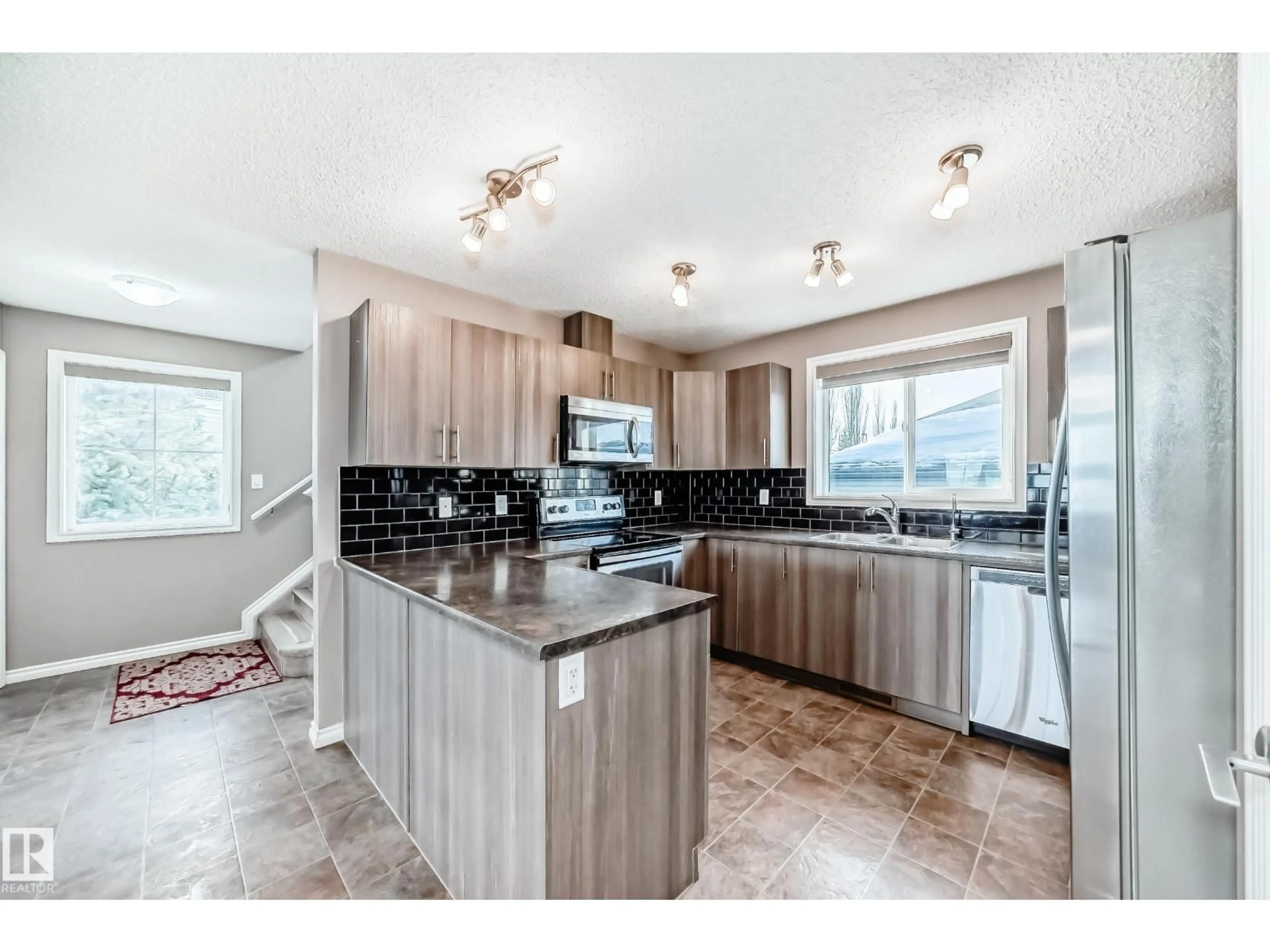 Open concept kitchen, unknown for 9332 211 ST, Edmonton Alberta T5T4T8