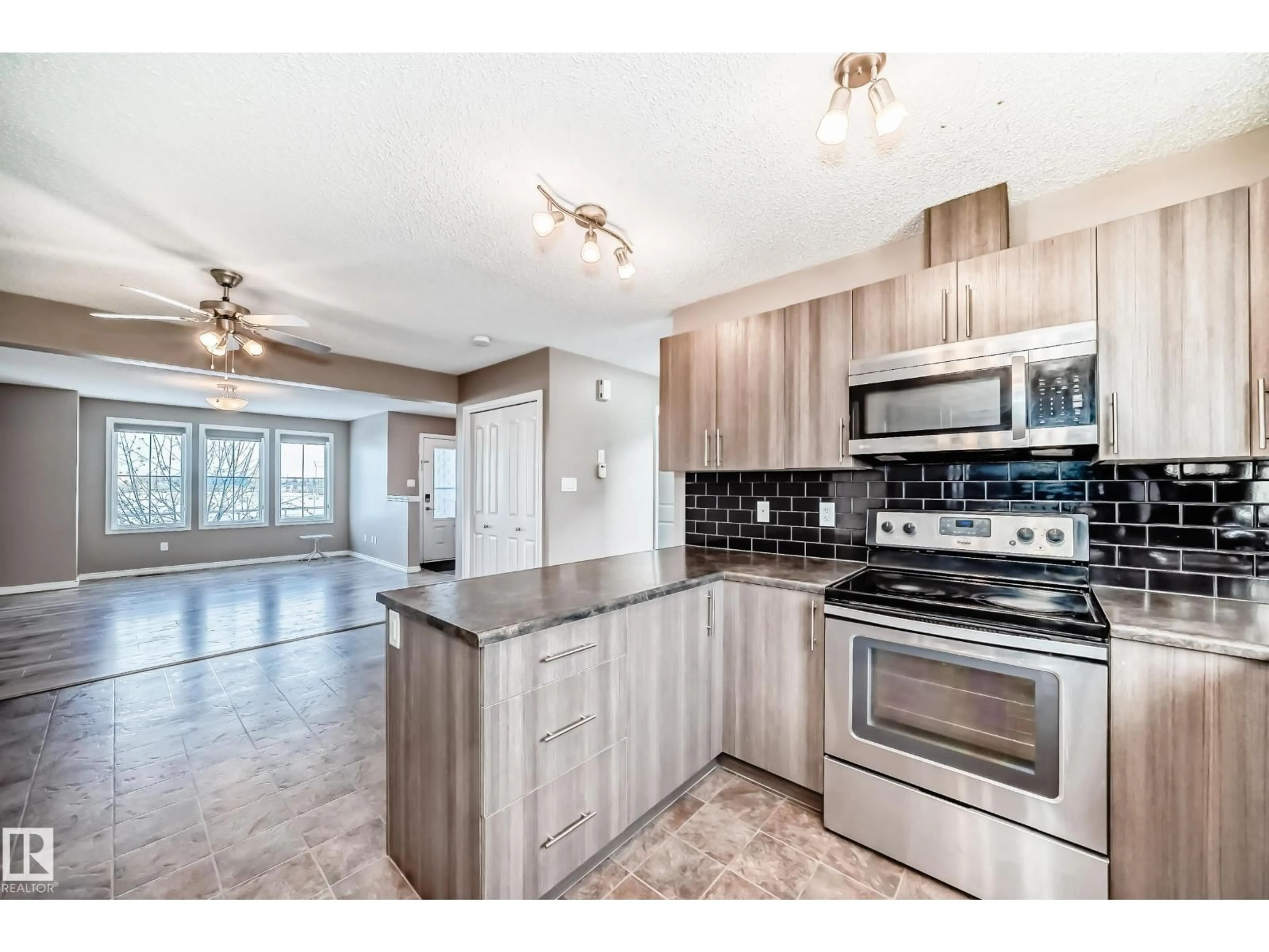 Open concept kitchen, unknown for 9332 211 ST, Edmonton Alberta T5T4T8