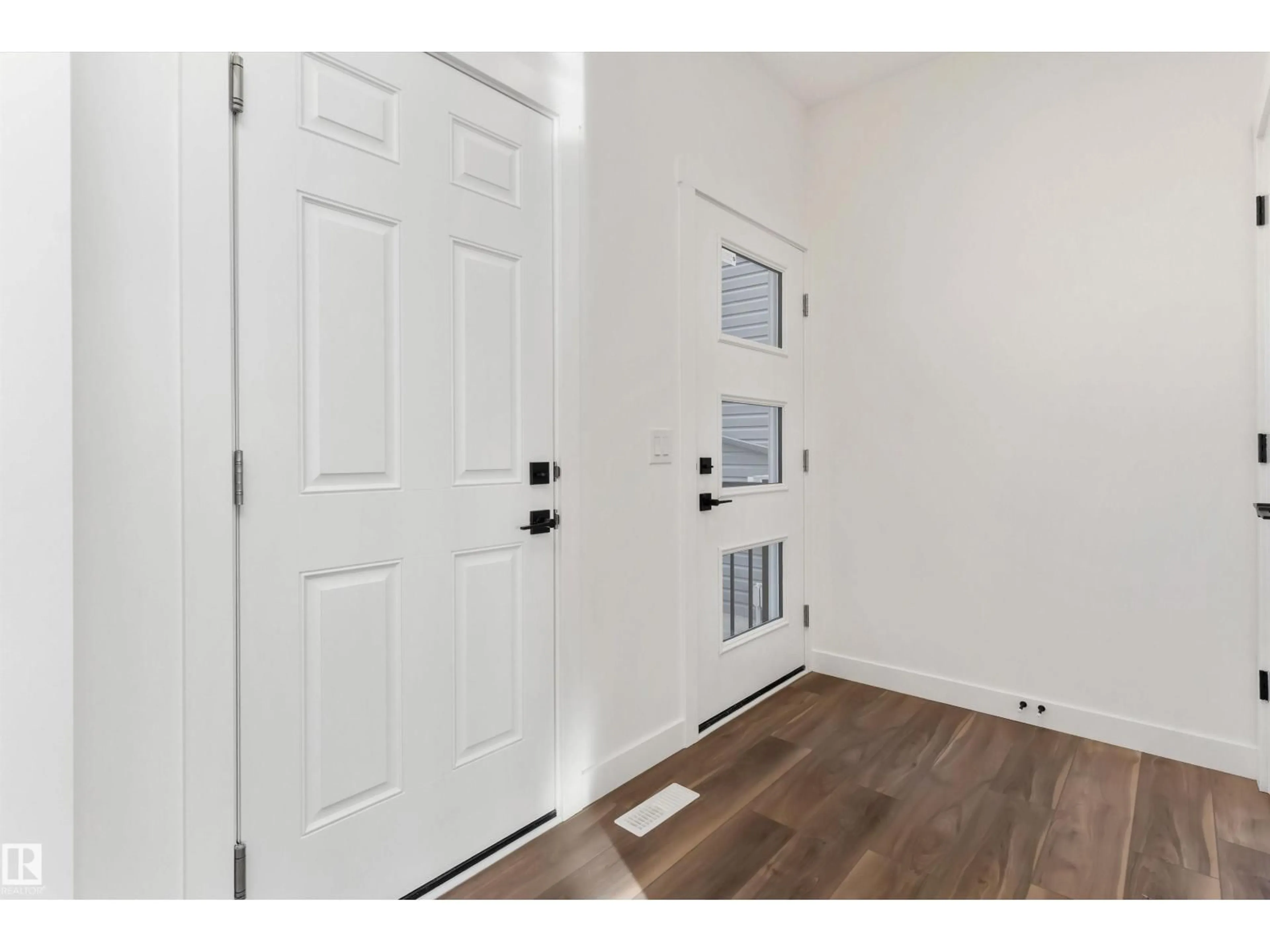 Indoor entryway for NW - 19107 20 AV, Edmonton Alberta T6M3E8