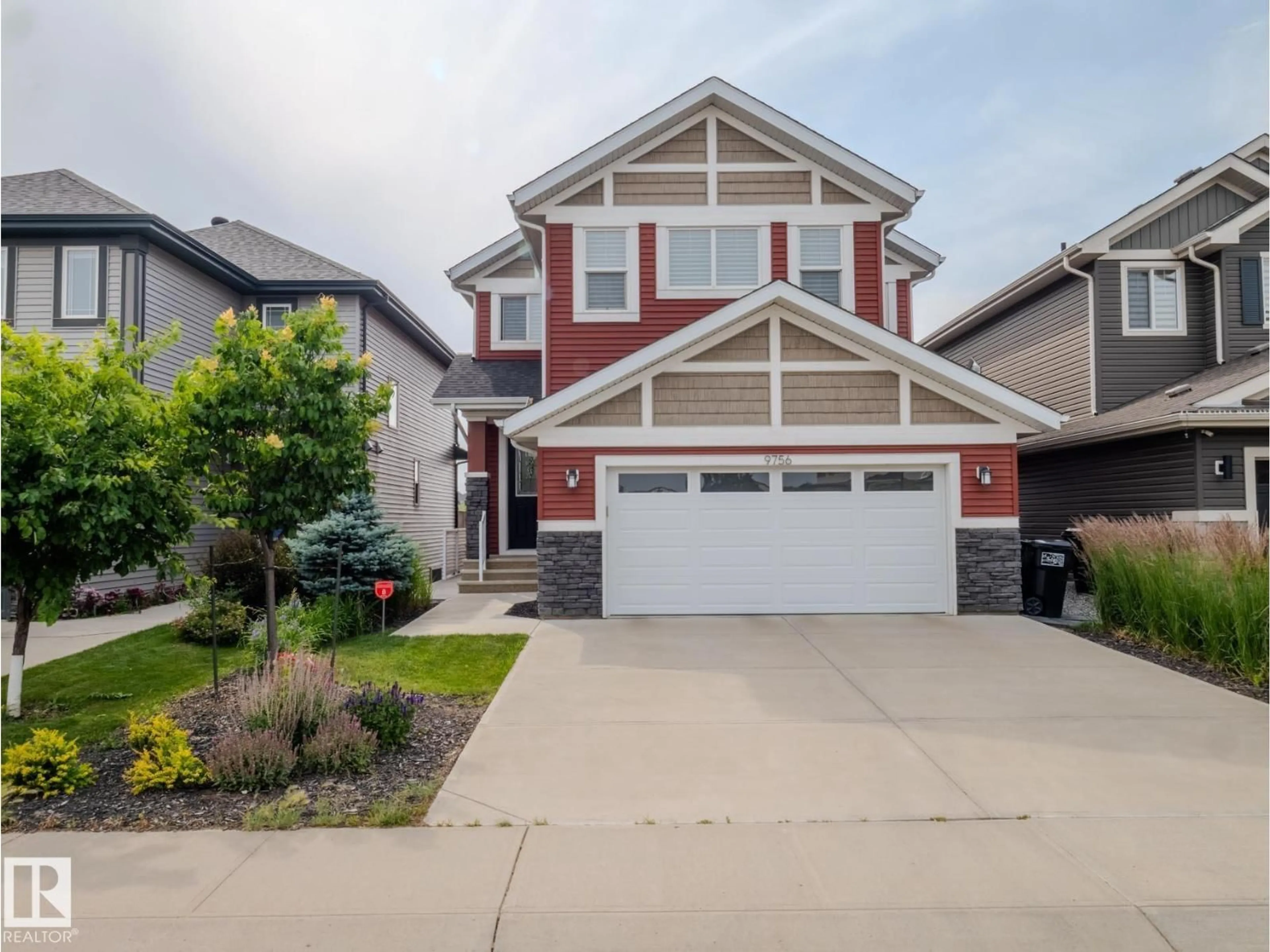 Home with vinyl exterior material, street for NW - 9756 222 ST, Edmonton Alberta T5T7B9