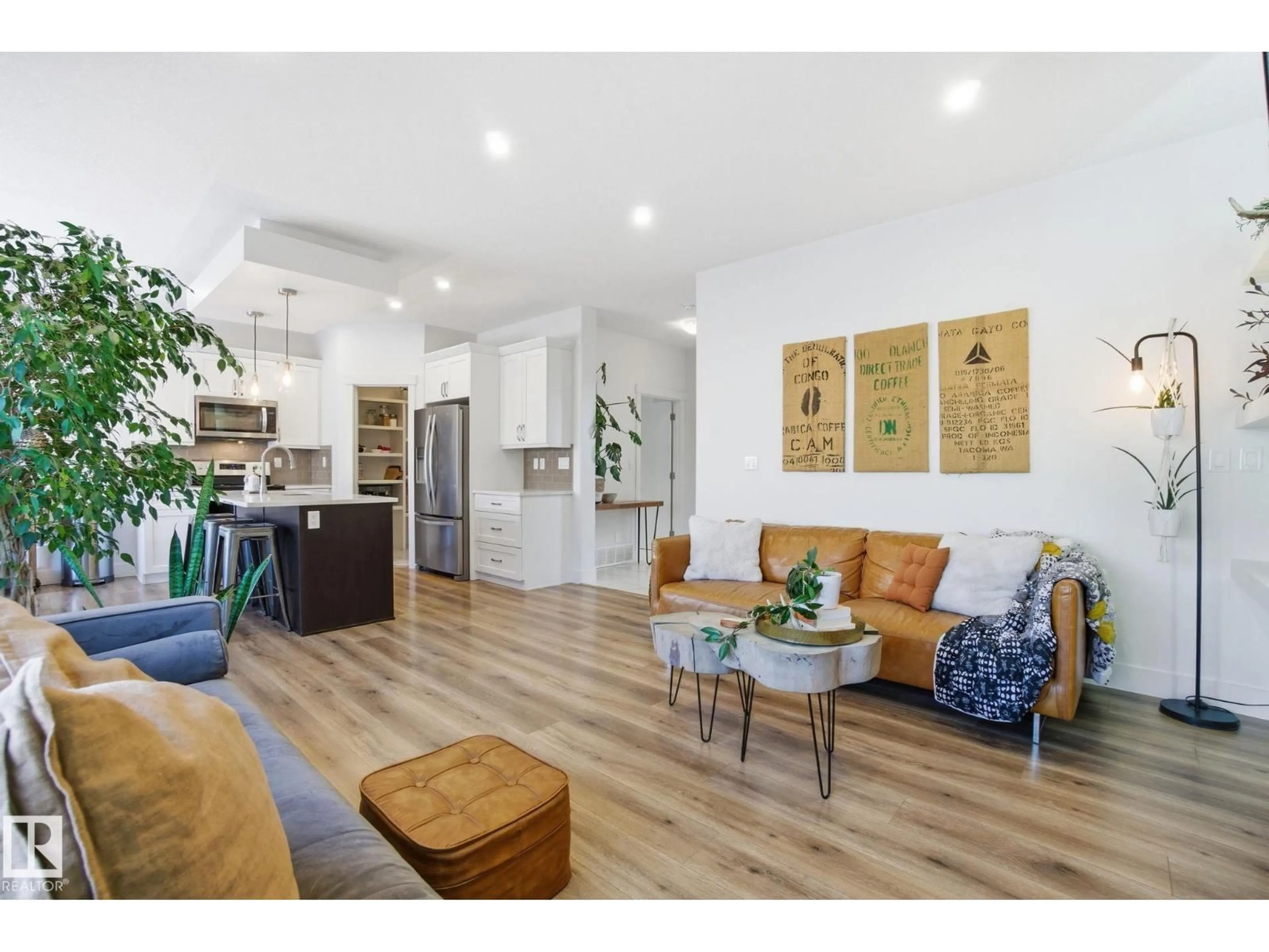 Living room with furniture, wood/laminate floor for 8712 96A AV, Morinville Alberta T8R2N9