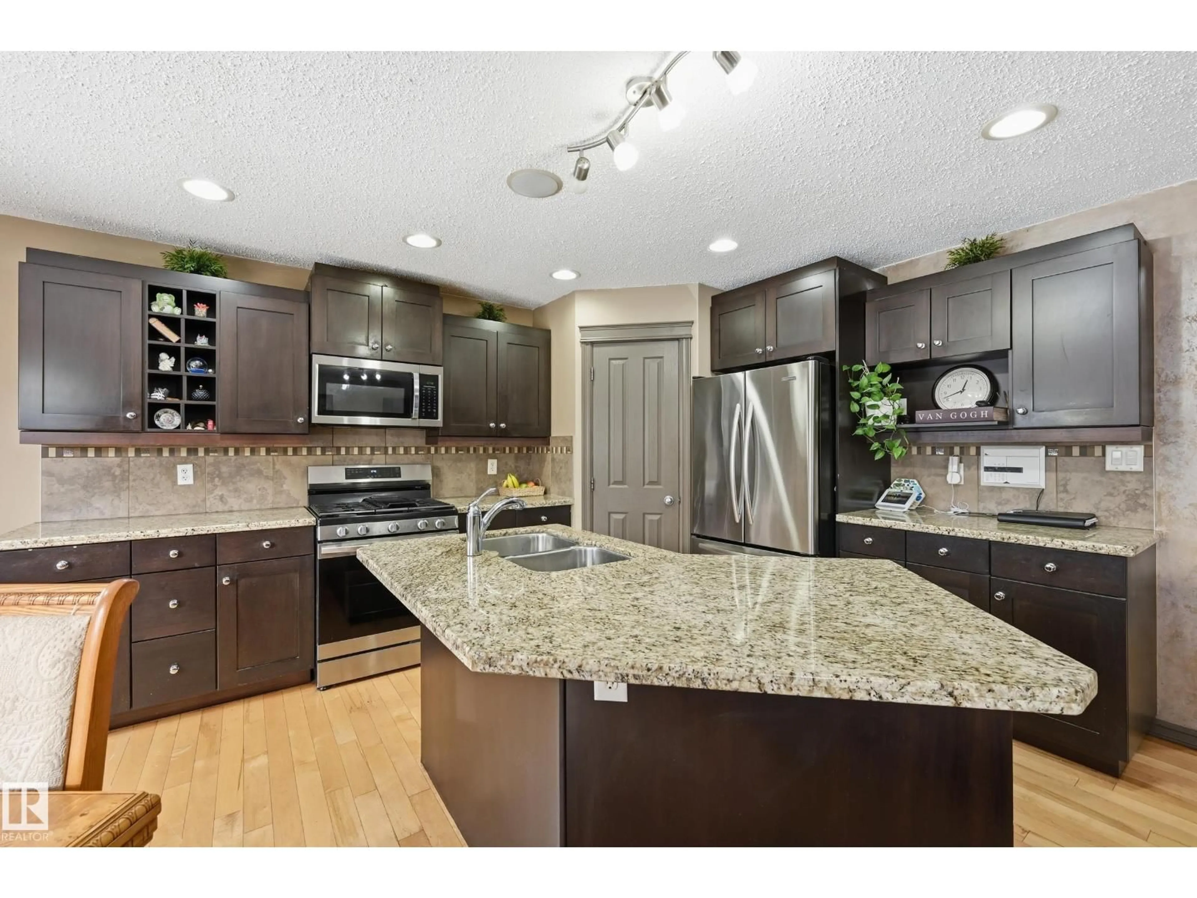 Open concept kitchen, ceramic/tile floor for 1440 POTTER GREENS DR, Edmonton Alberta T5T1J8