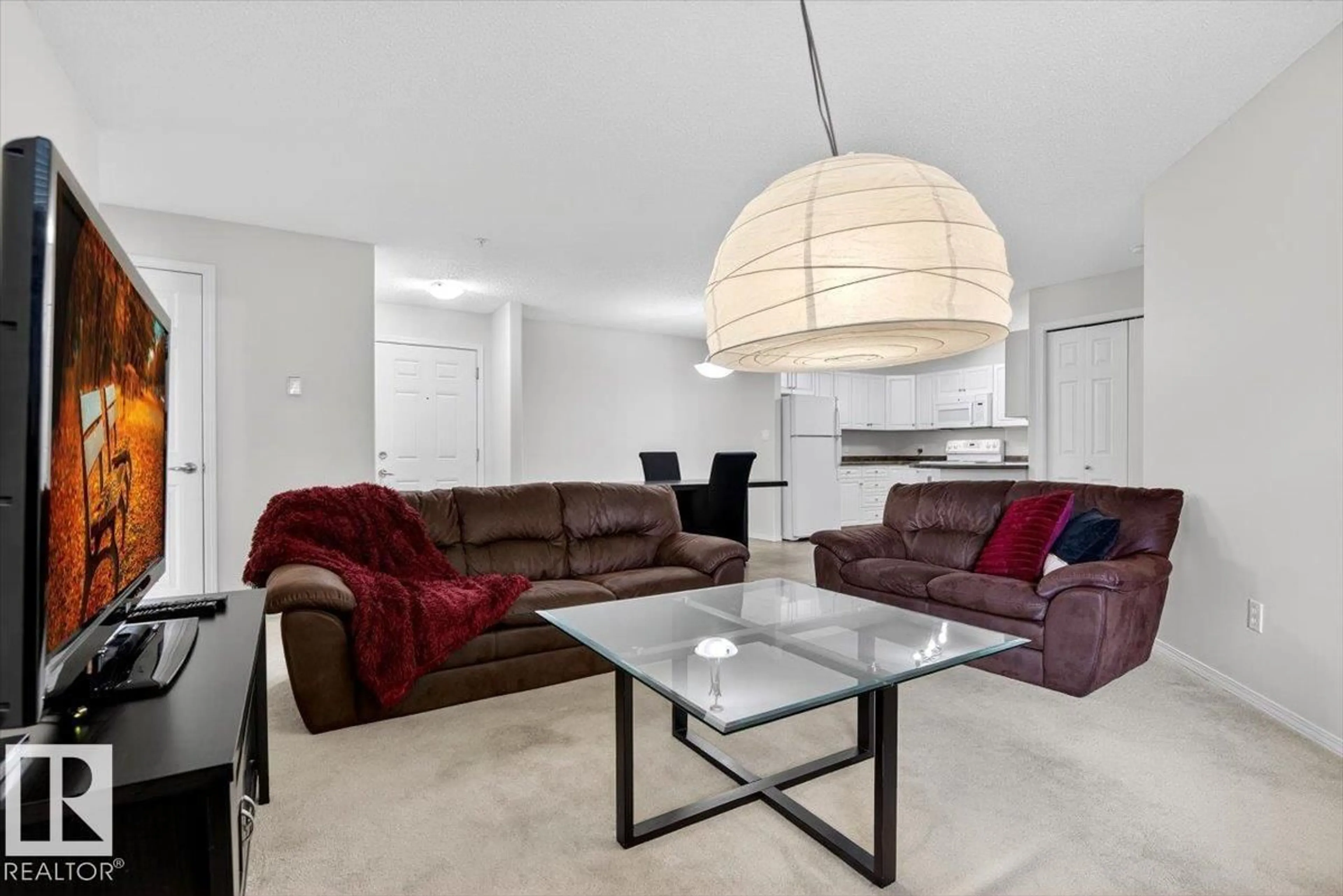 Living room with furniture, unknown for #322 - 13625 34 ST, Edmonton Alberta T5A0E3