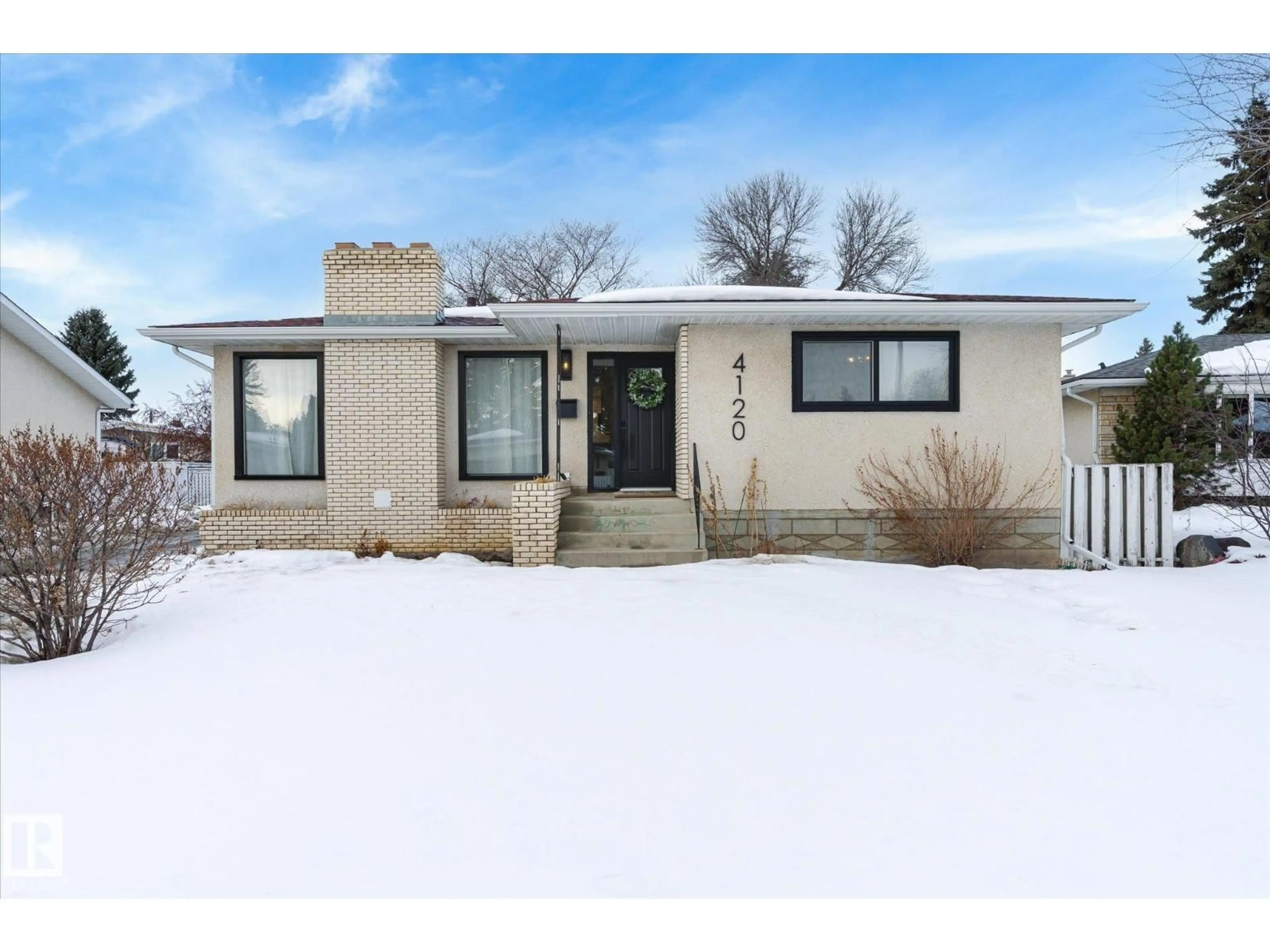 Home with vinyl exterior material, street for 4120 108 ST NW, Edmonton Alberta T6J2P8