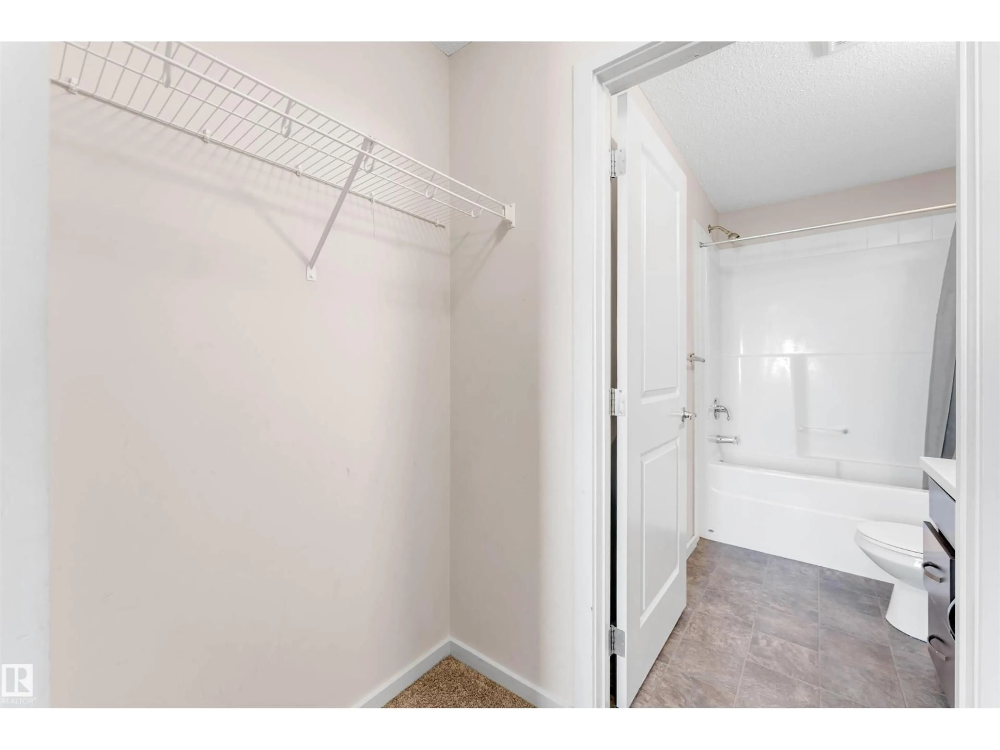 Storage room or clothes room or walk-in closet for #313 - 5404 7 AV SW, Edmonton Alberta T6X2K4