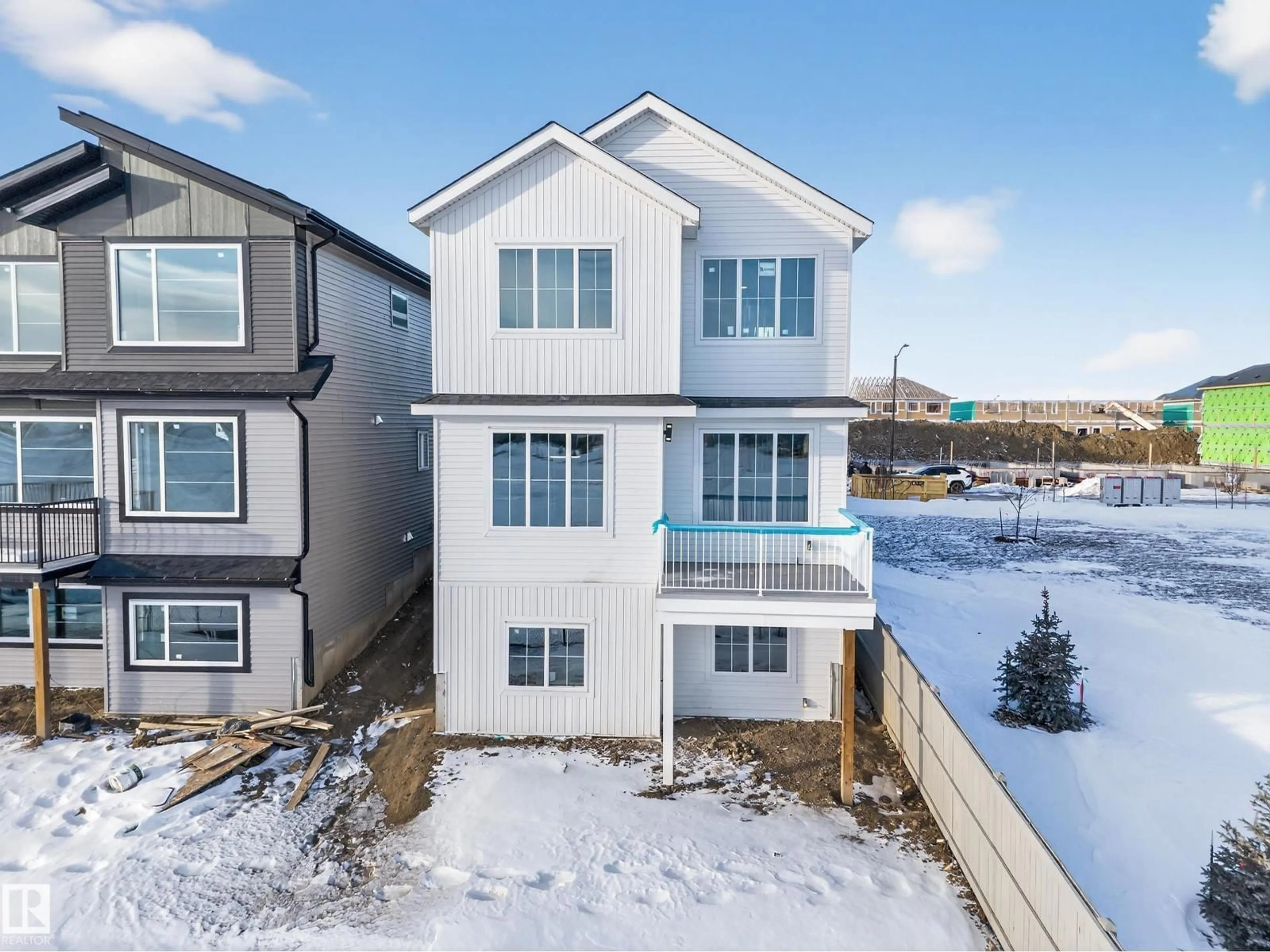 A pic from outside/outdoor area/front of a property/back of a property/a pic from drone, water/lake/river/ocean view for 437 CRYSTAL CREEK LINK, Leduc Alberta T9E0X6