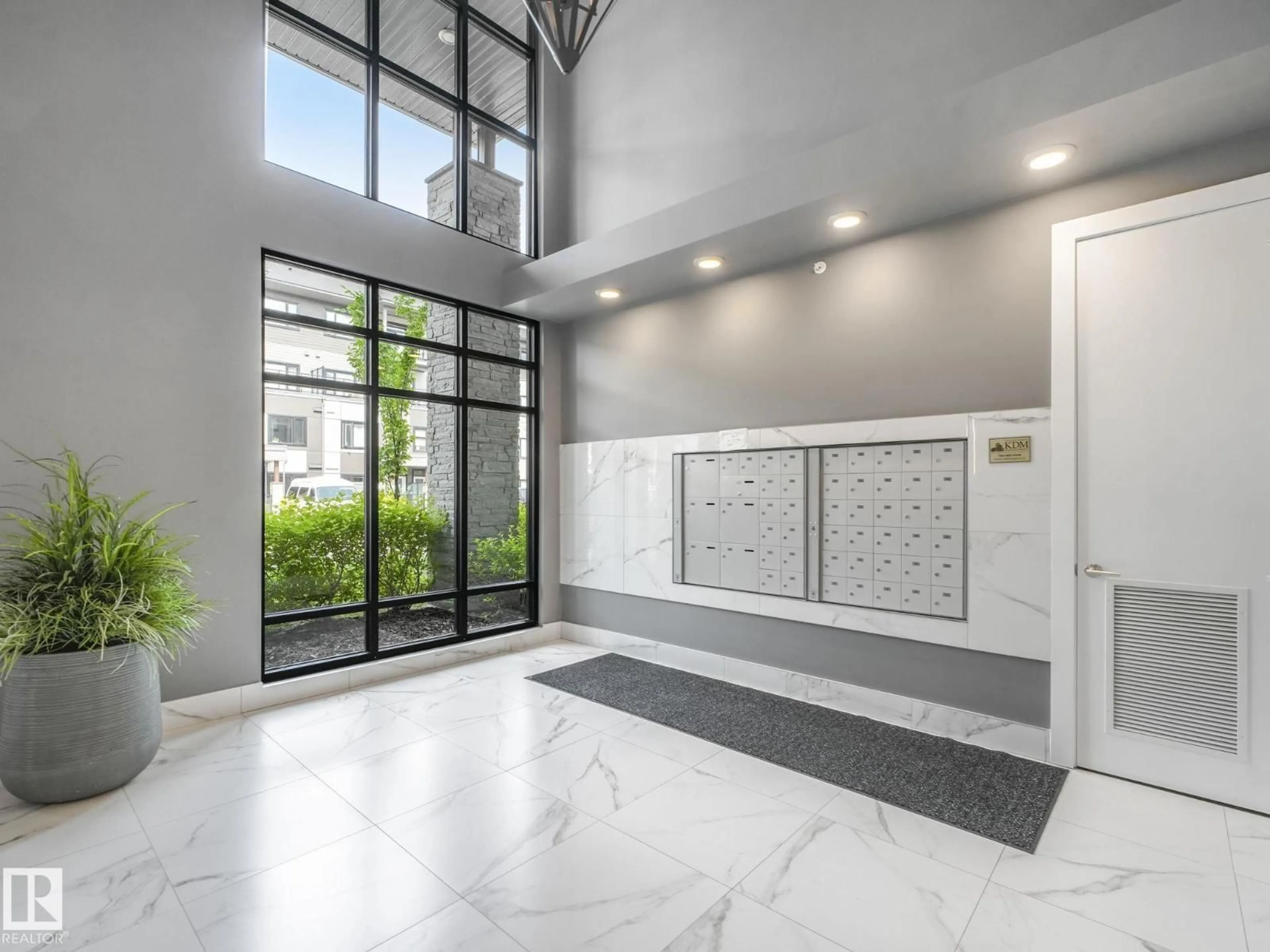 Indoor foyer for 117 GRIESBACH PARADE, Edmonton Alberta T5E6X2