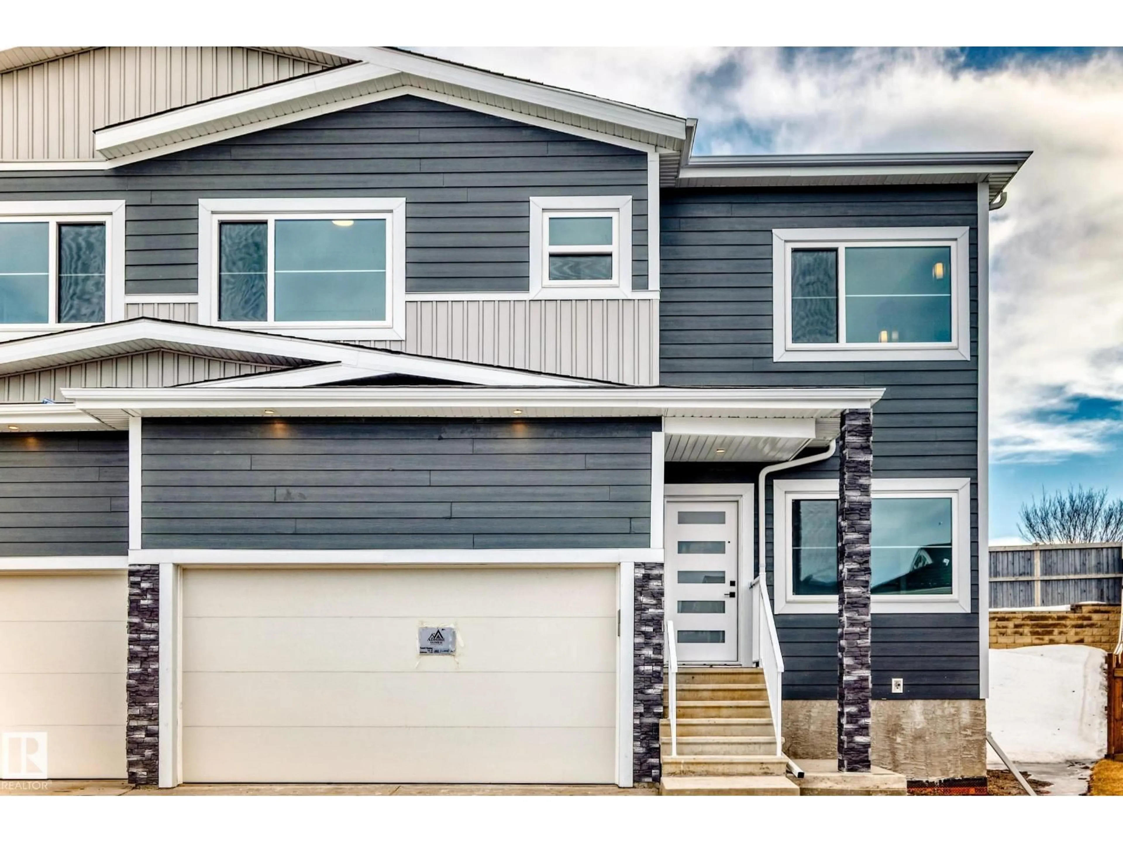 Home with vinyl exterior material, street for 48 HAZELWOOD LN, Spruce Grove Alberta T7X0R7