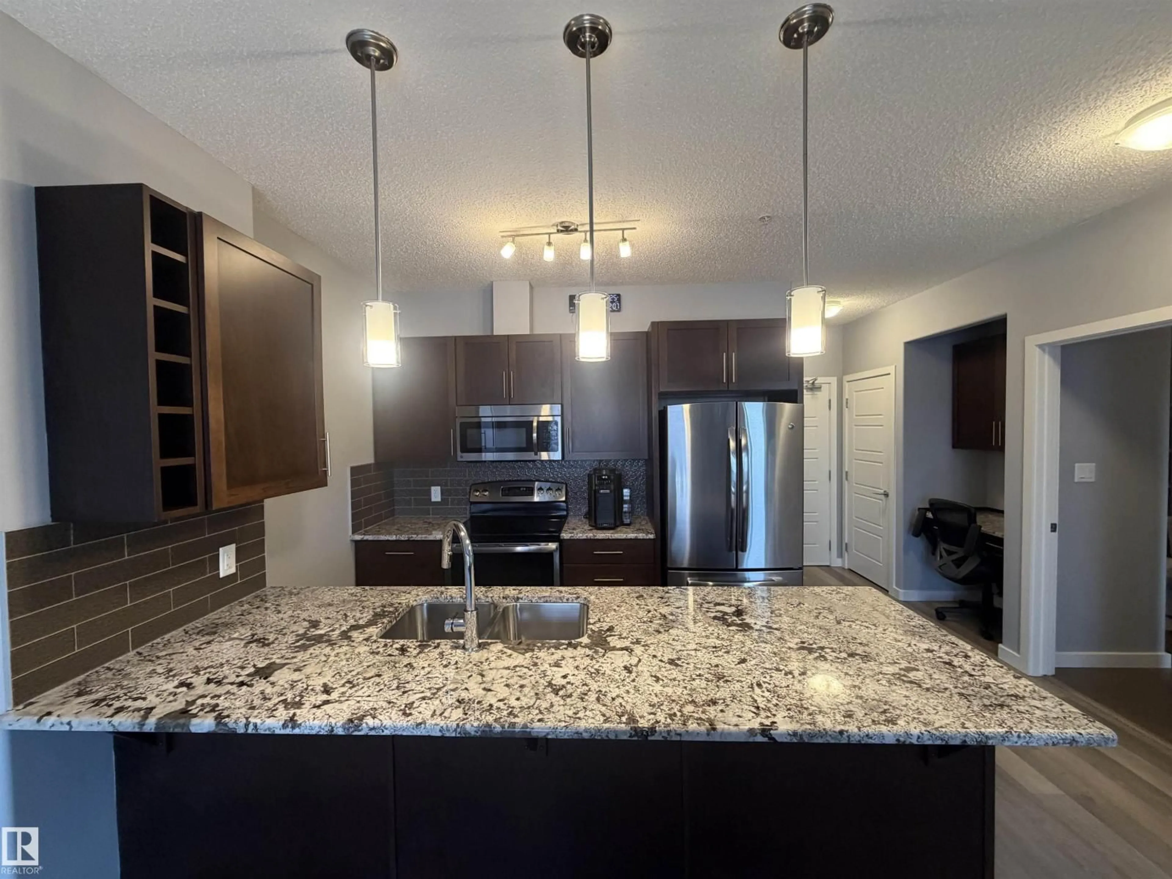 Open concept kitchen, ceramic/tile floor for 417 - 1004 ROSENTHAL BV, Edmonton Alberta T5T7C6