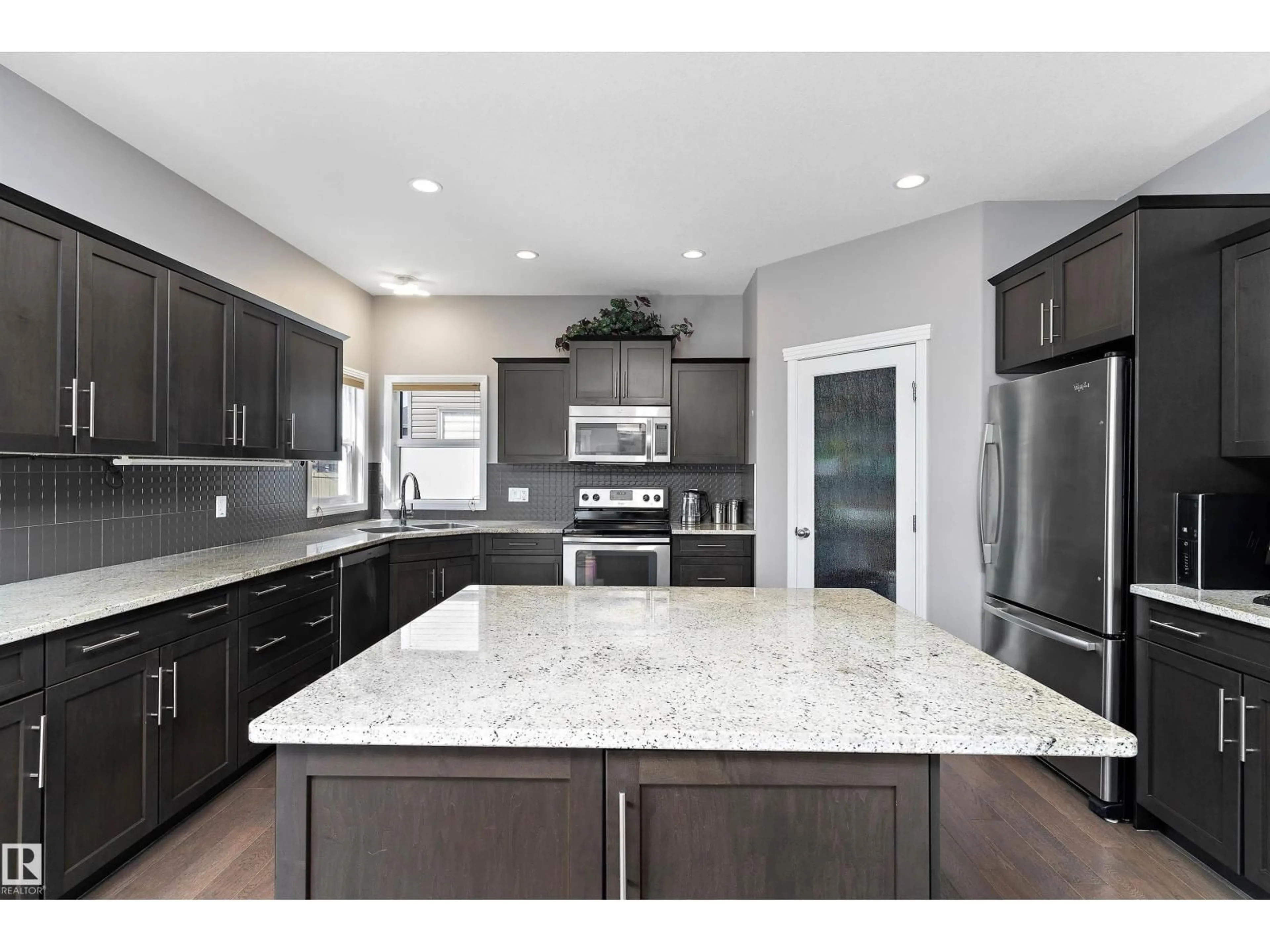 Open concept kitchen, ceramic/tile floor for 1325 ADAMSON DR, Edmonton Alberta T6W2N8