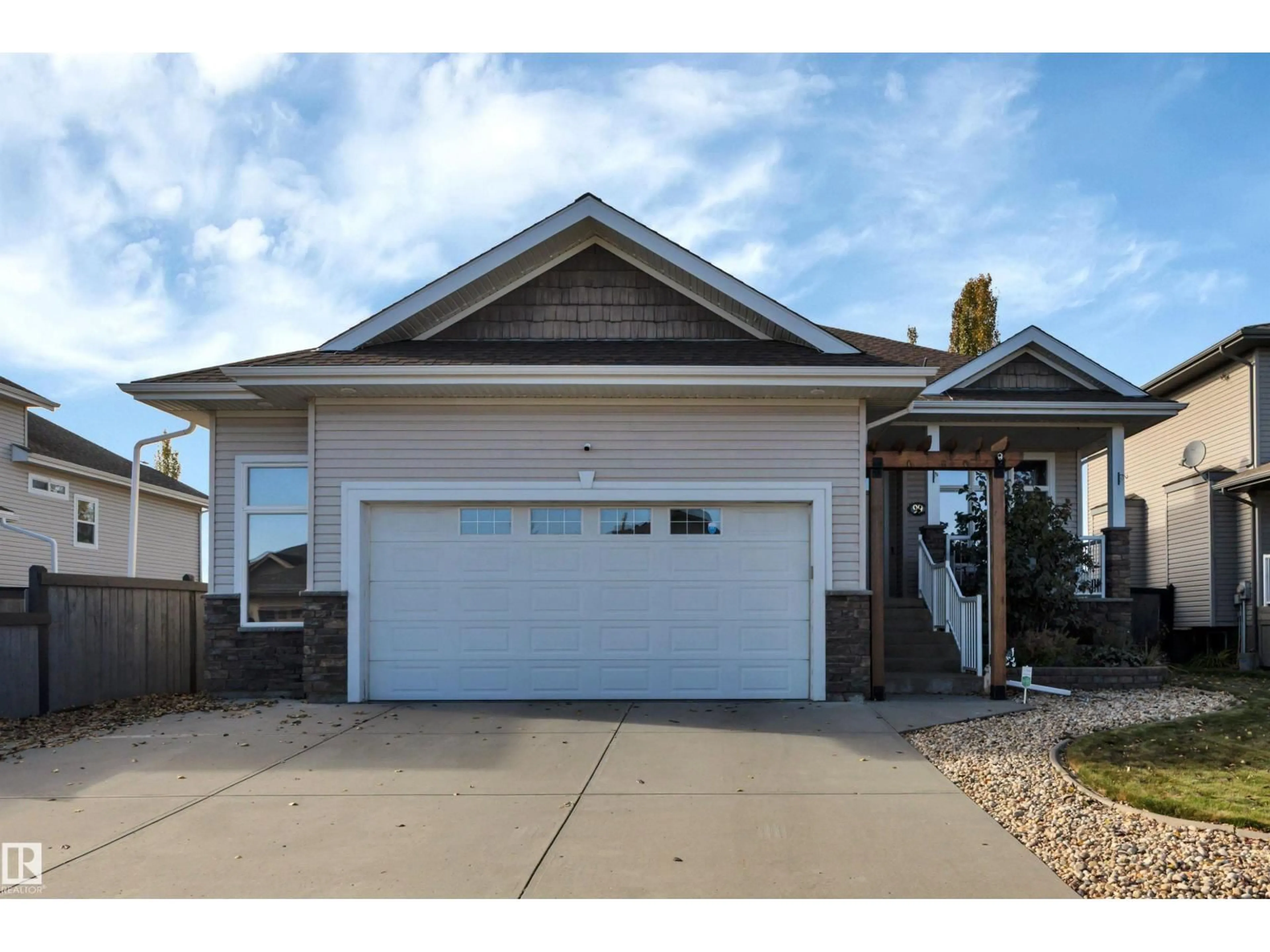 Home with vinyl exterior material, street for 99 SHORES DR, Leduc Alberta T9E8T4