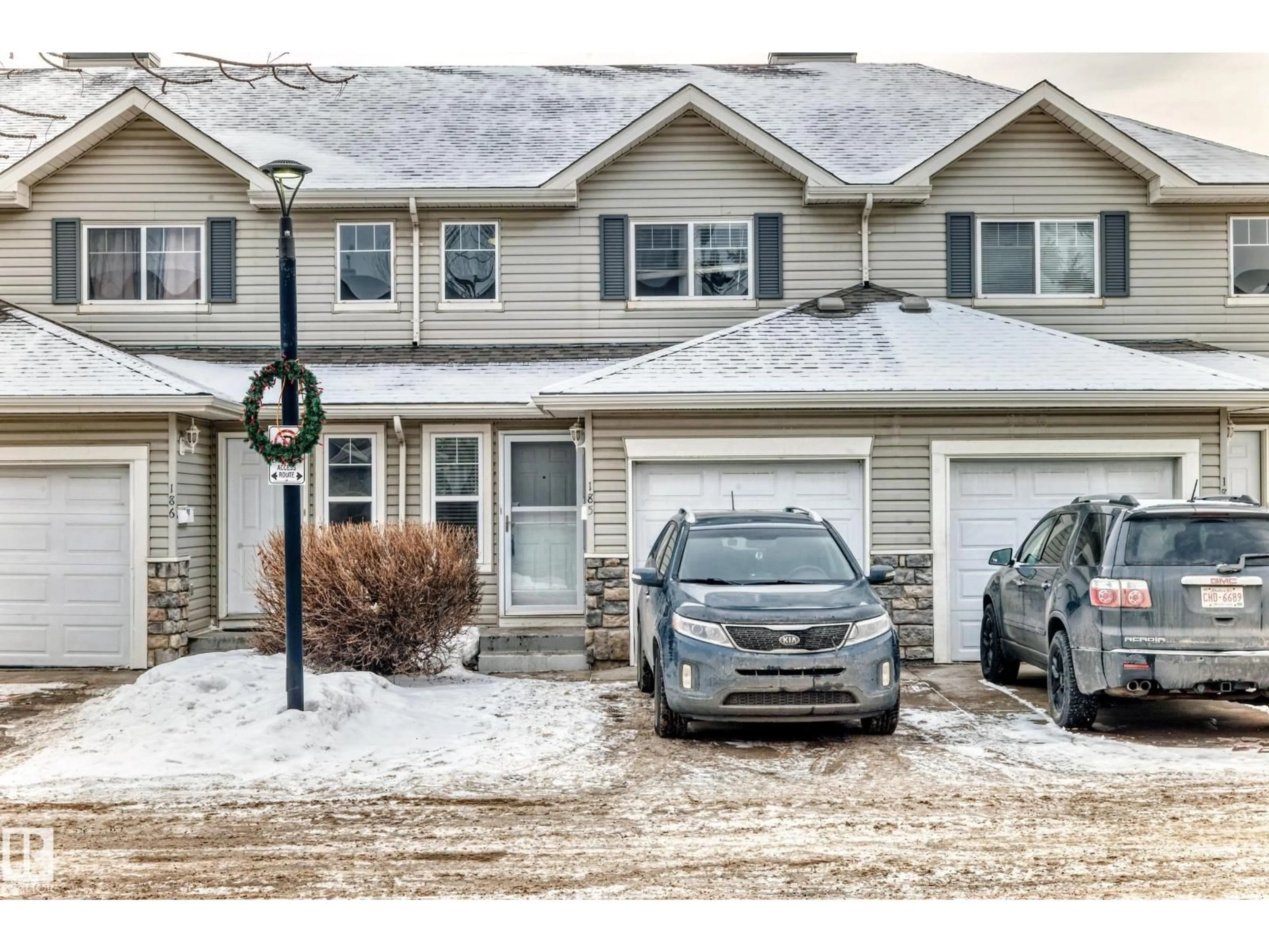 A pic from outside/outdoor area/front of a property/back of a property/a pic from drone, street for 230 - 185 EDWARDS DR, Edmonton Alberta T6X1G7