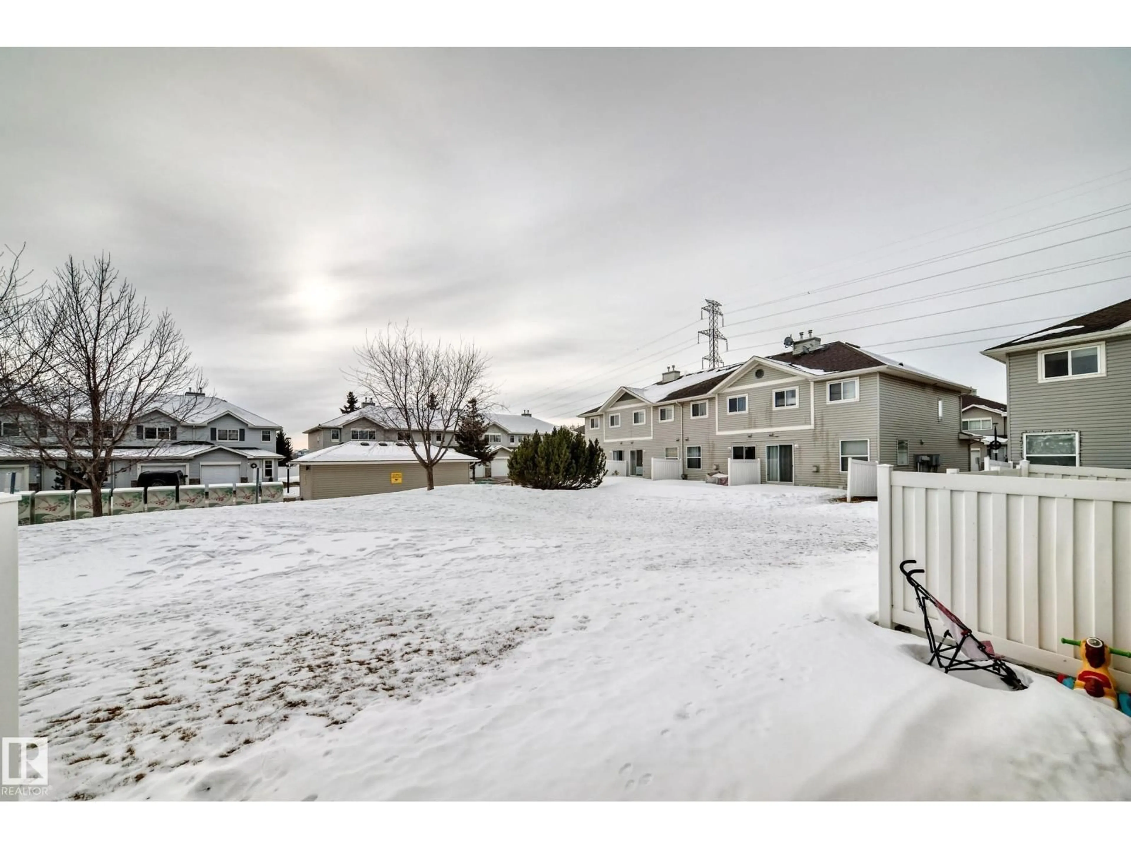 A pic from outside/outdoor area/front of a property/back of a property/a pic from drone, street for 230 - 185 EDWARDS DR, Edmonton Alberta T6X1G7