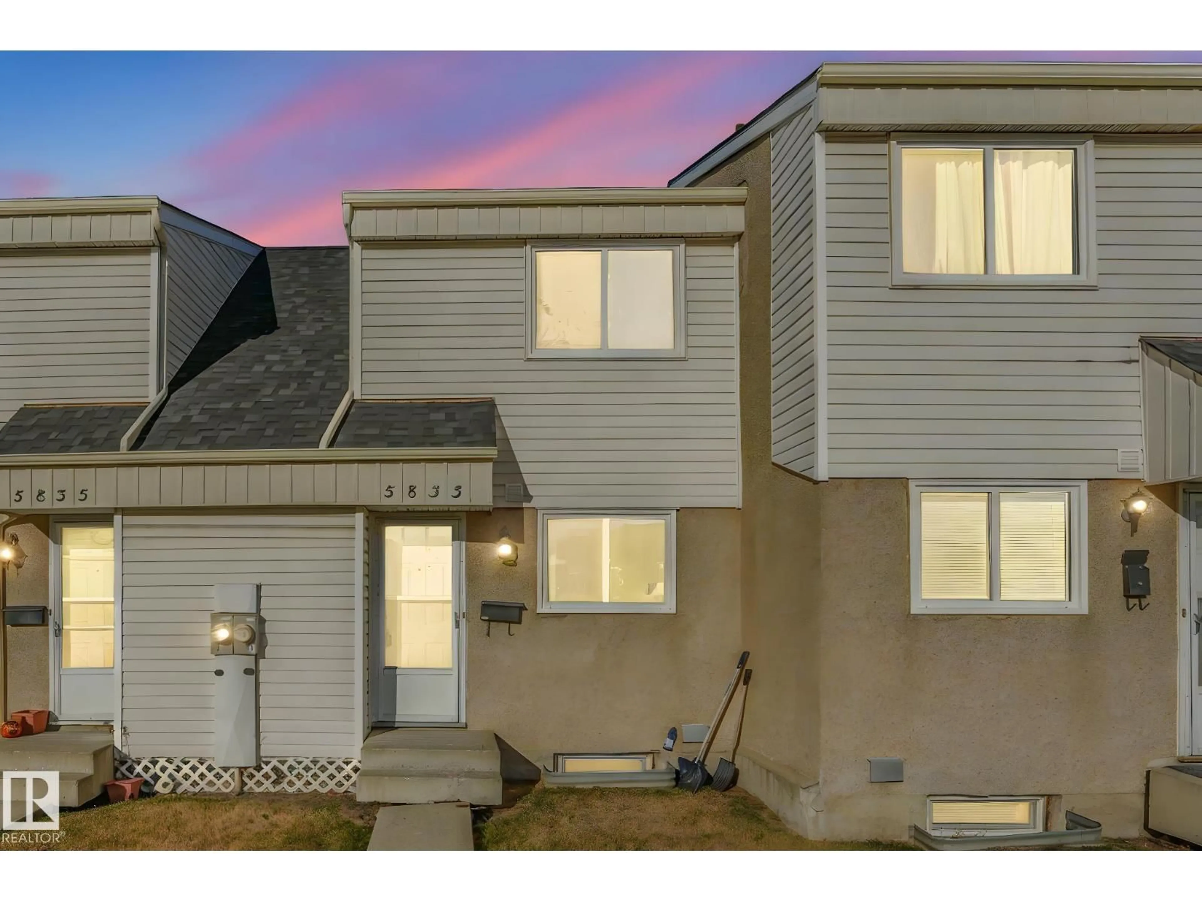 Home with vinyl exterior material, street for 5833 RIVERBEND RD, Edmonton Alberta T6H5A8