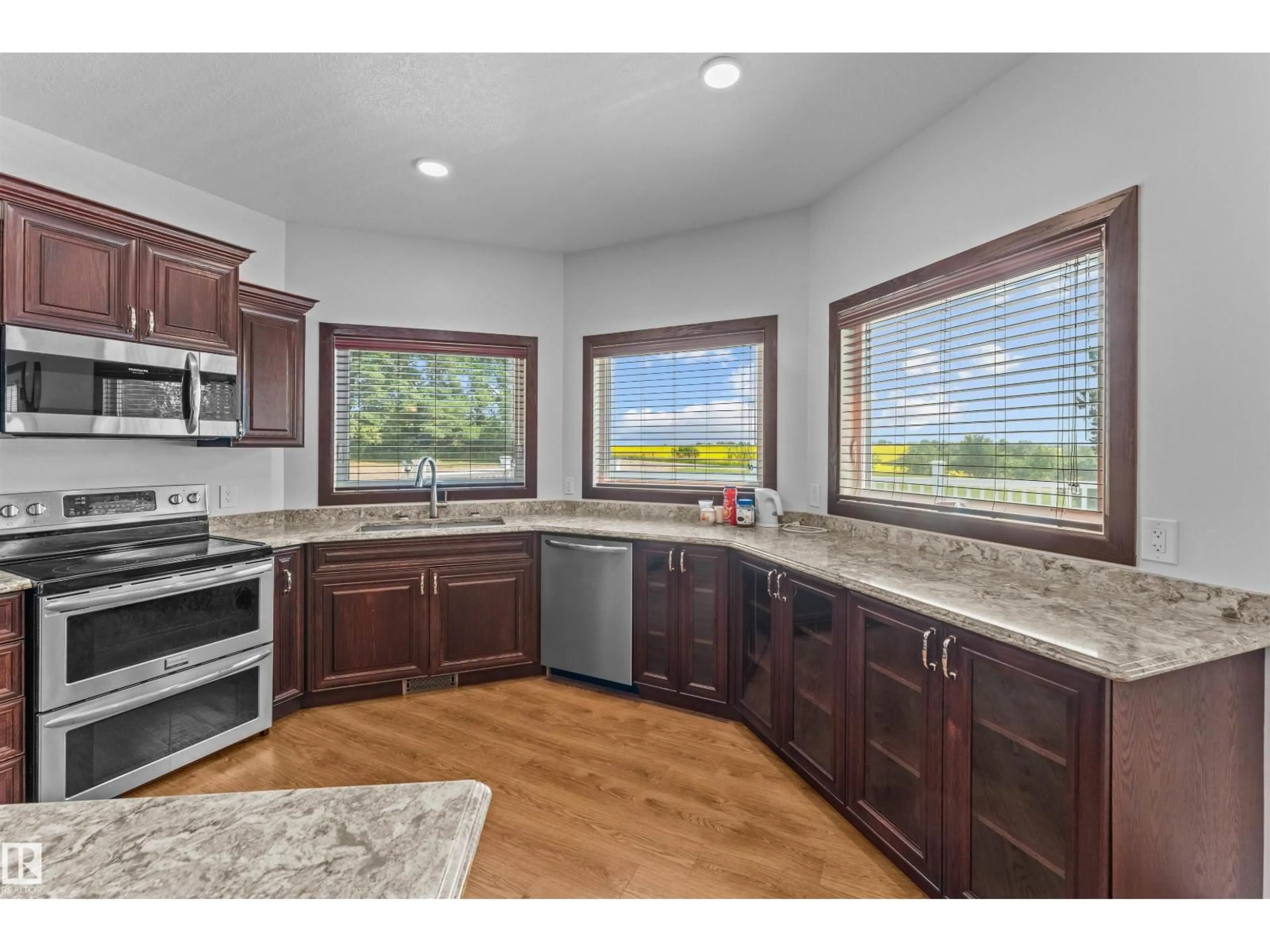 Open concept kitchen, ceramic/tile floor for 564032-564034 RANGE ROAD 130, Rural Two Hills County Alberta T0B0P0