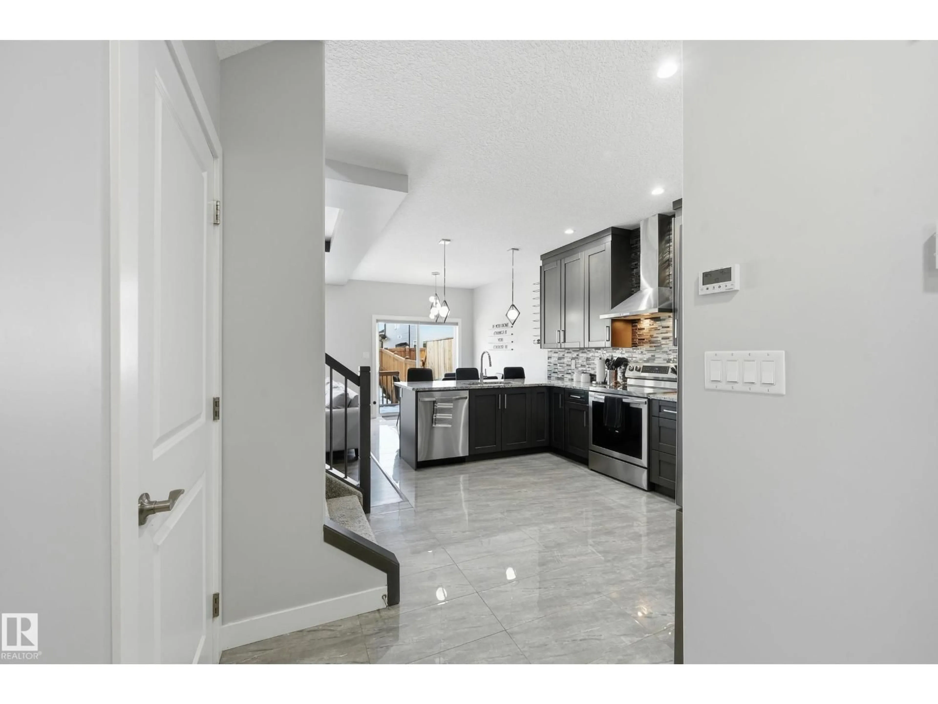 Contemporary kitchen, ceramic/tile floor for NW - 16813 65 ST, Edmonton Alberta T5Y3X9