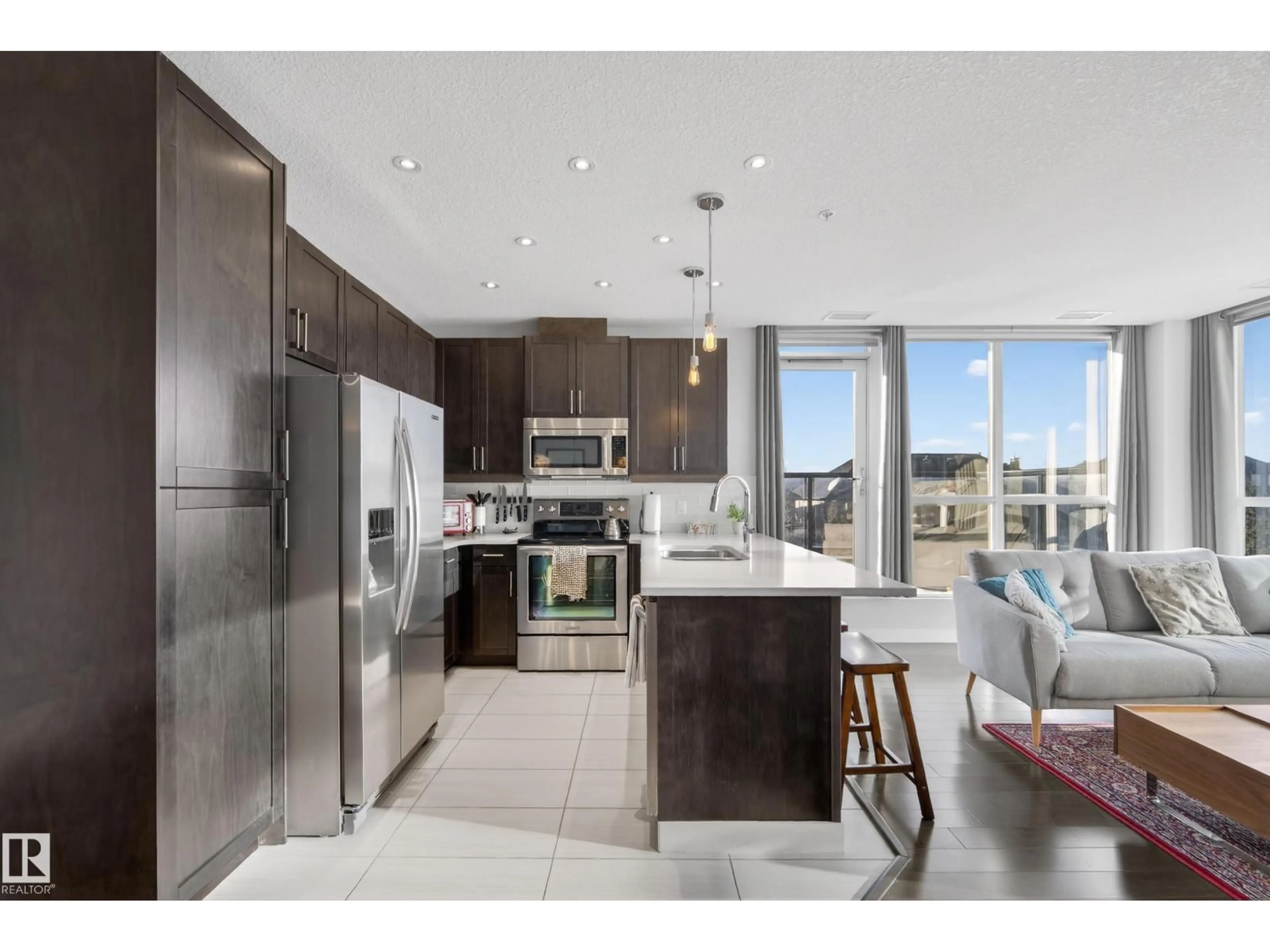 Open concept kitchen, ceramic/tile floor for 5151 - 201 WINDERMERE BV, Edmonton Alberta T6W2K4