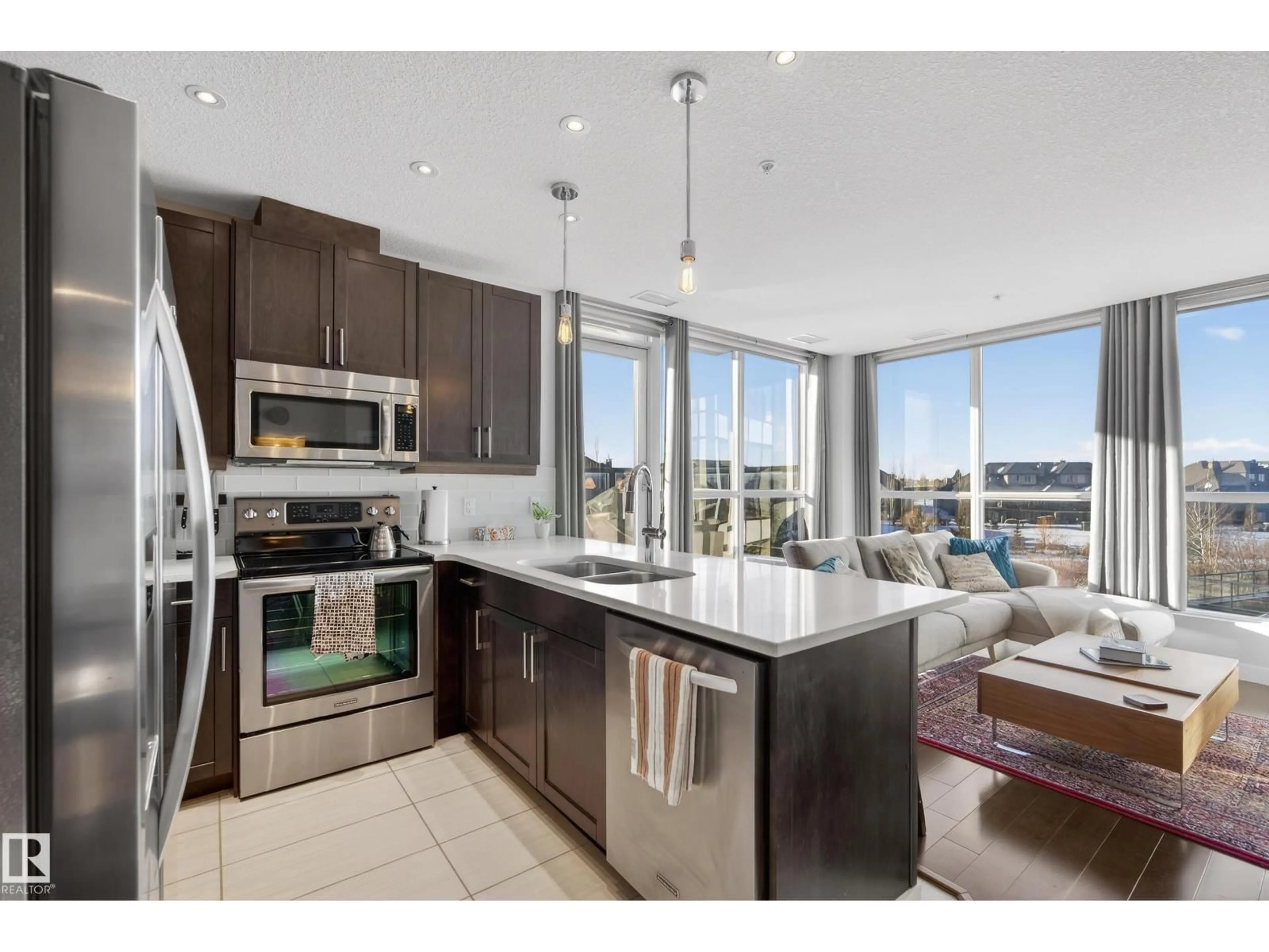 Open concept kitchen, ceramic/tile floor for 5151 - 201 WINDERMERE BV, Edmonton Alberta T6W2K4