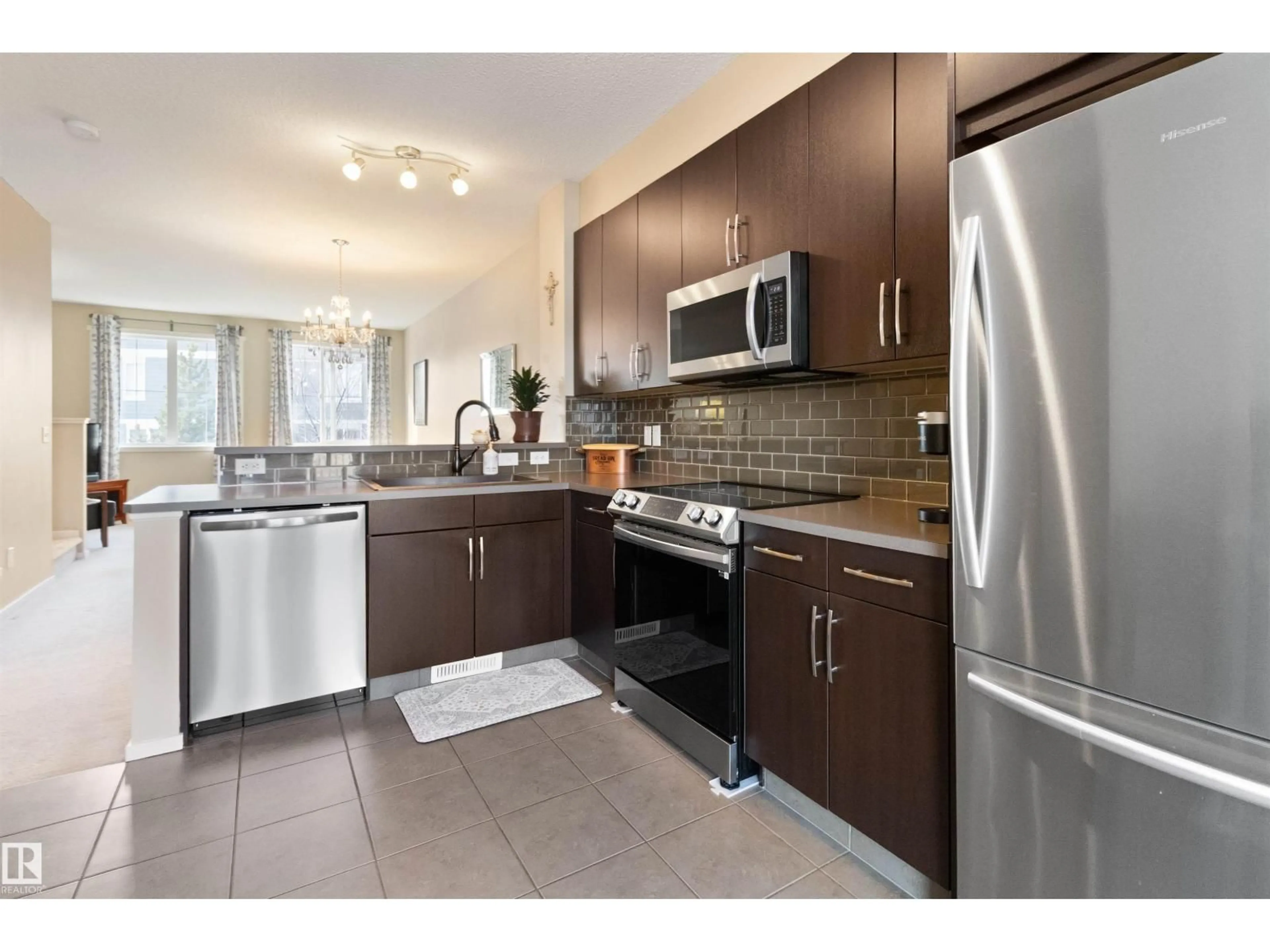 Open concept kitchen, ceramic/tile floor for 603 - 157 WATT BV, Edmonton Alberta T6X0P3