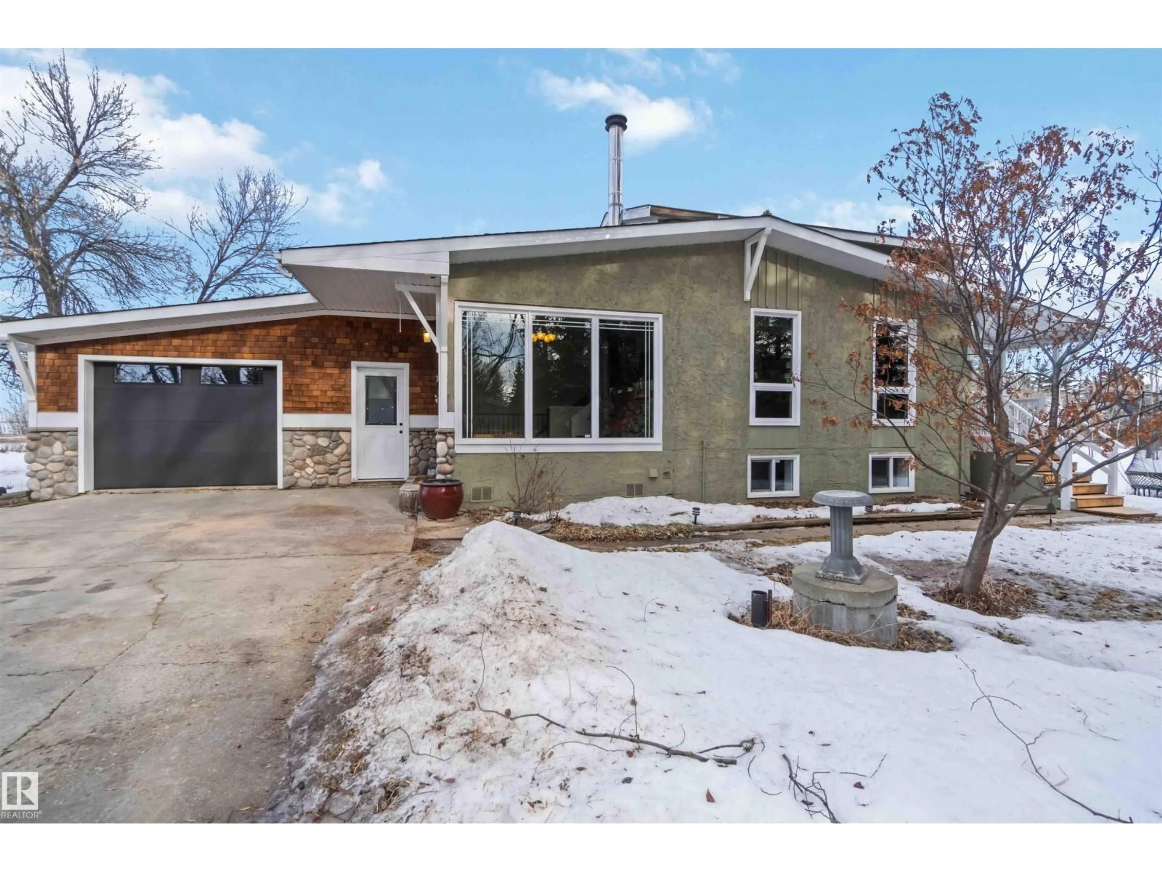 Home with brick exterior material, street for 91 - 54200 RGE ROAD 265, Rural Sturgeon County Alberta T8T0E2