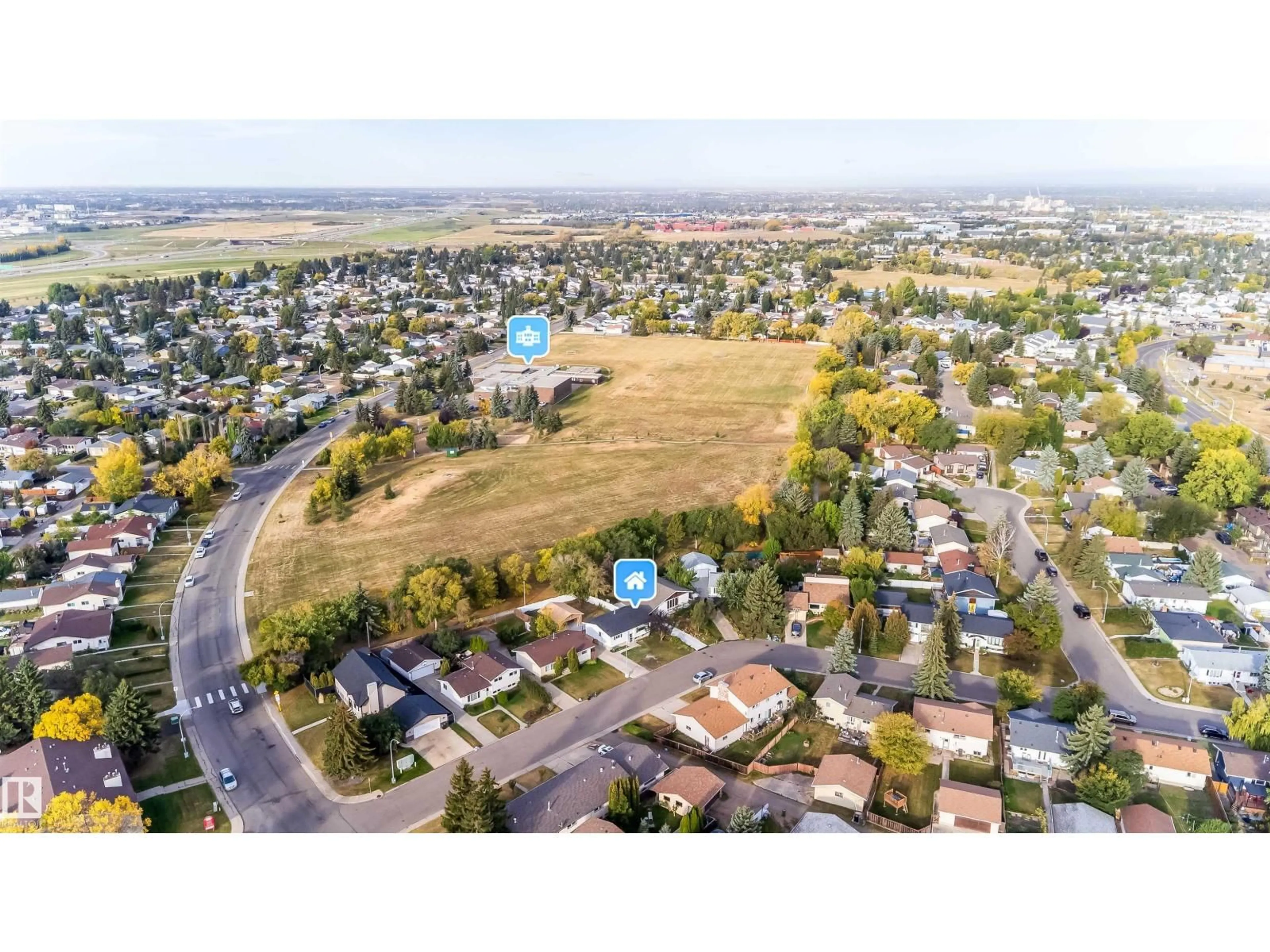 A pic from outside/outdoor area/front of a property/back of a property/a pic from drone, mountain view for 7115 12 AV, Edmonton Alberta T6K3H6