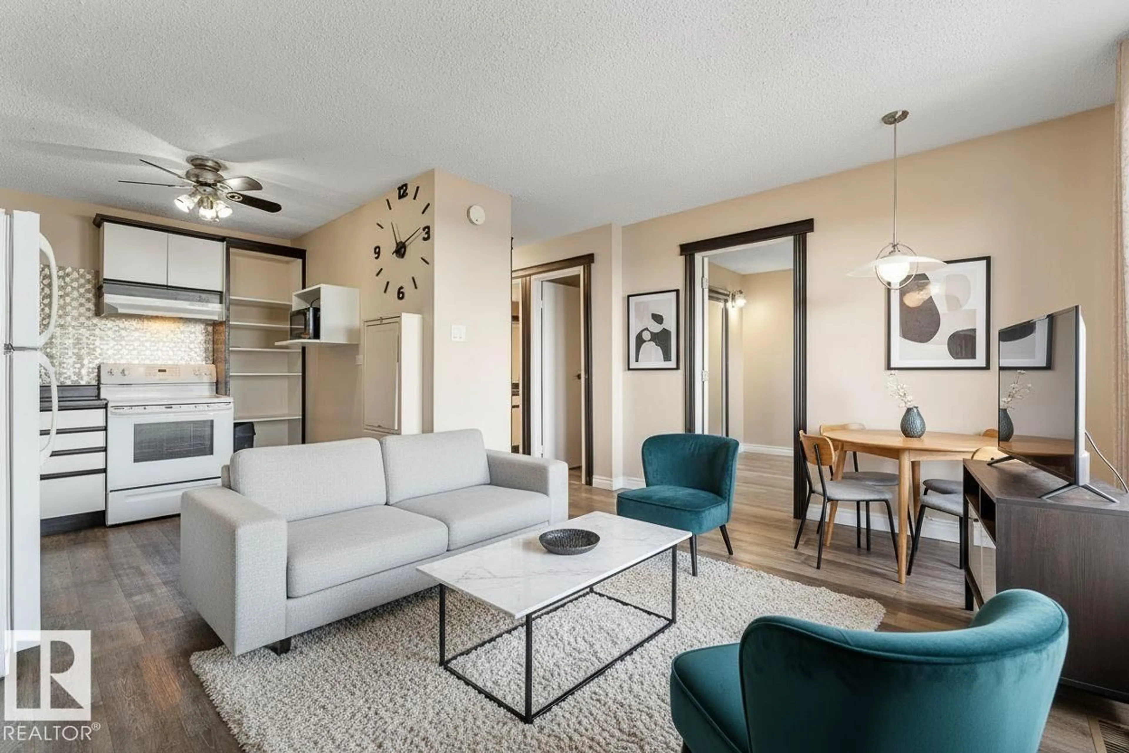 Living room with furniture, unknown for 10150 - 1202 117 ST NW, Edmonton Alberta T5K2J2