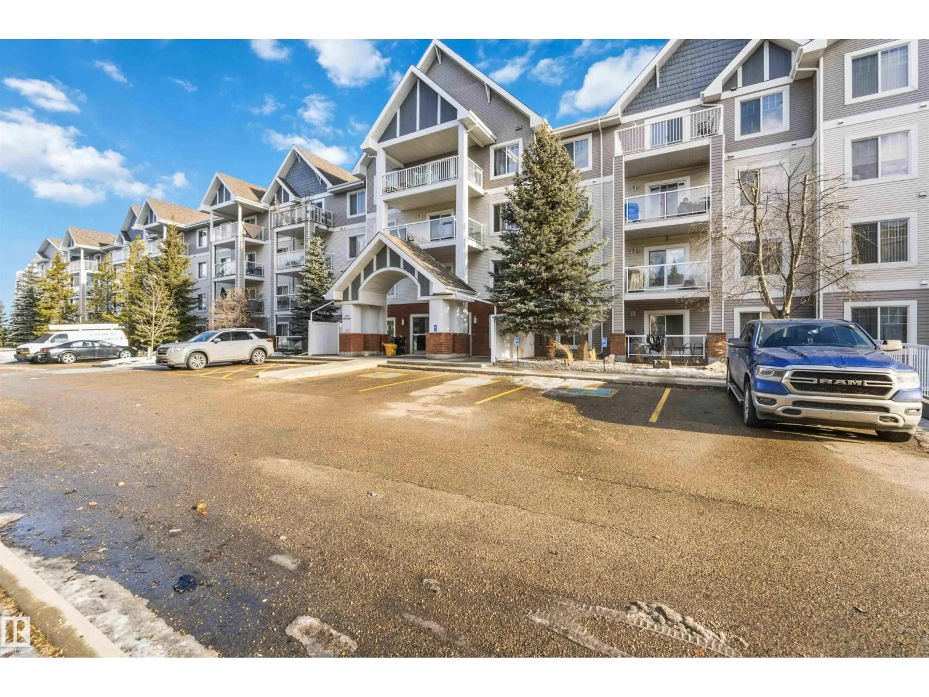 A pic from outside/outdoor area/front of a property/back of a property/a pic from drone, mountain view for #305 - 13710 150 AV, Edmonton Alberta T6V0B2