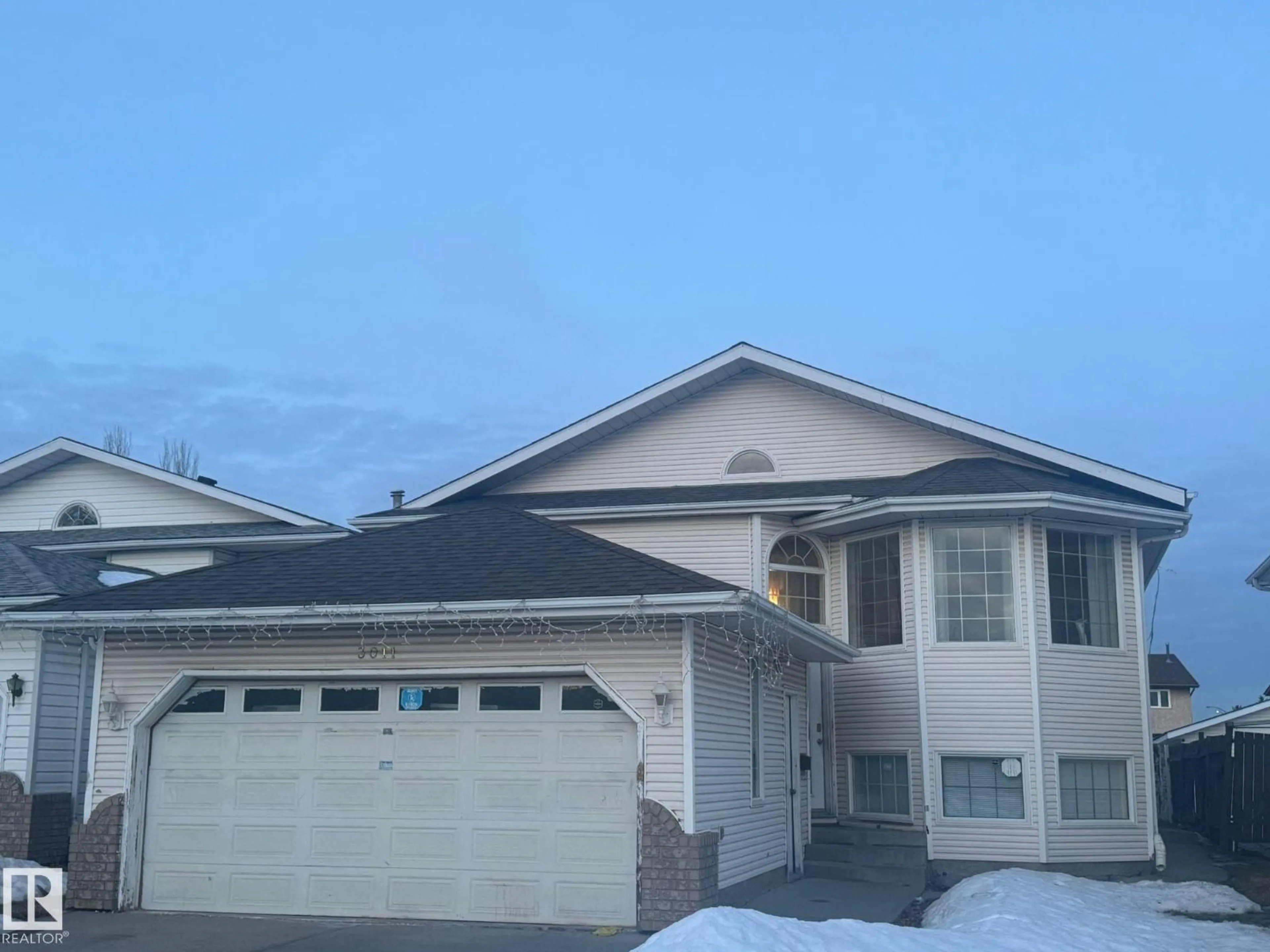 Home with vinyl exterior material, mountain view for 3011 37 ST, Edmonton Alberta T6L5R1