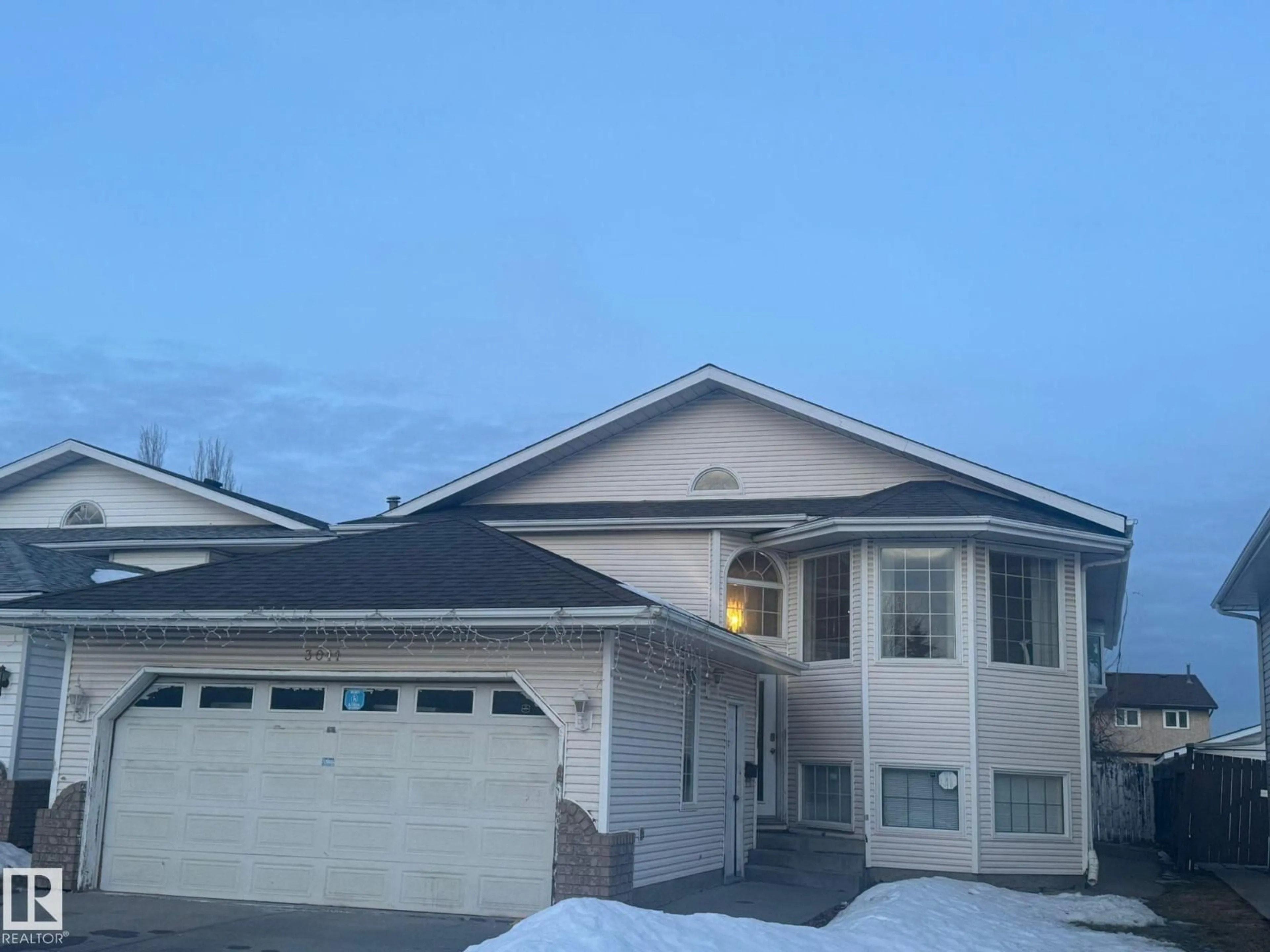 Home with vinyl exterior material, mountain view for 3011 37 ST, Edmonton Alberta T6L5R1