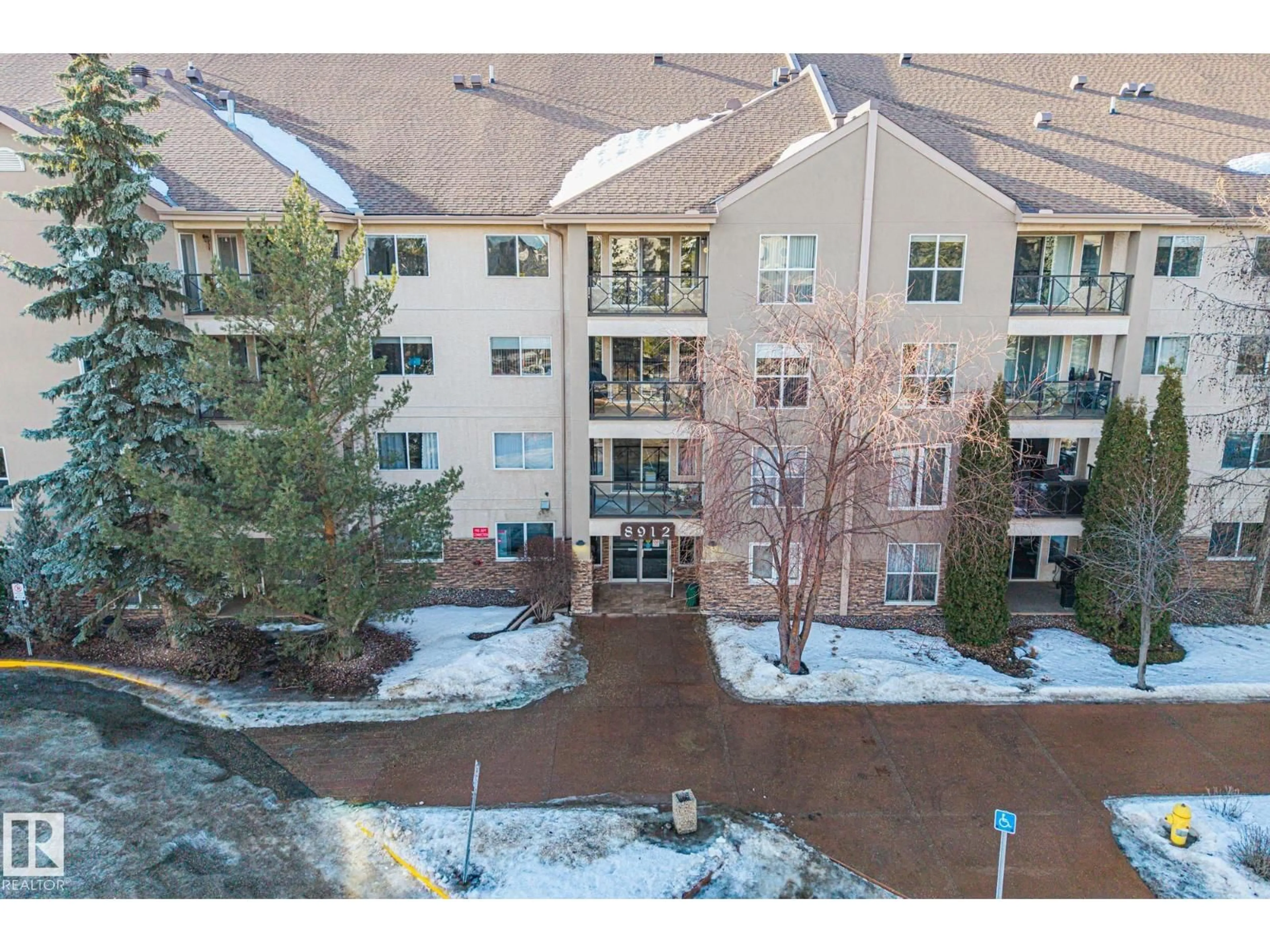 A pic from outside/outdoor area/front of a property/back of a property/a pic from drone, mountain view for 316 - 8912 156 ST, Edmonton Alberta T5R5Z2