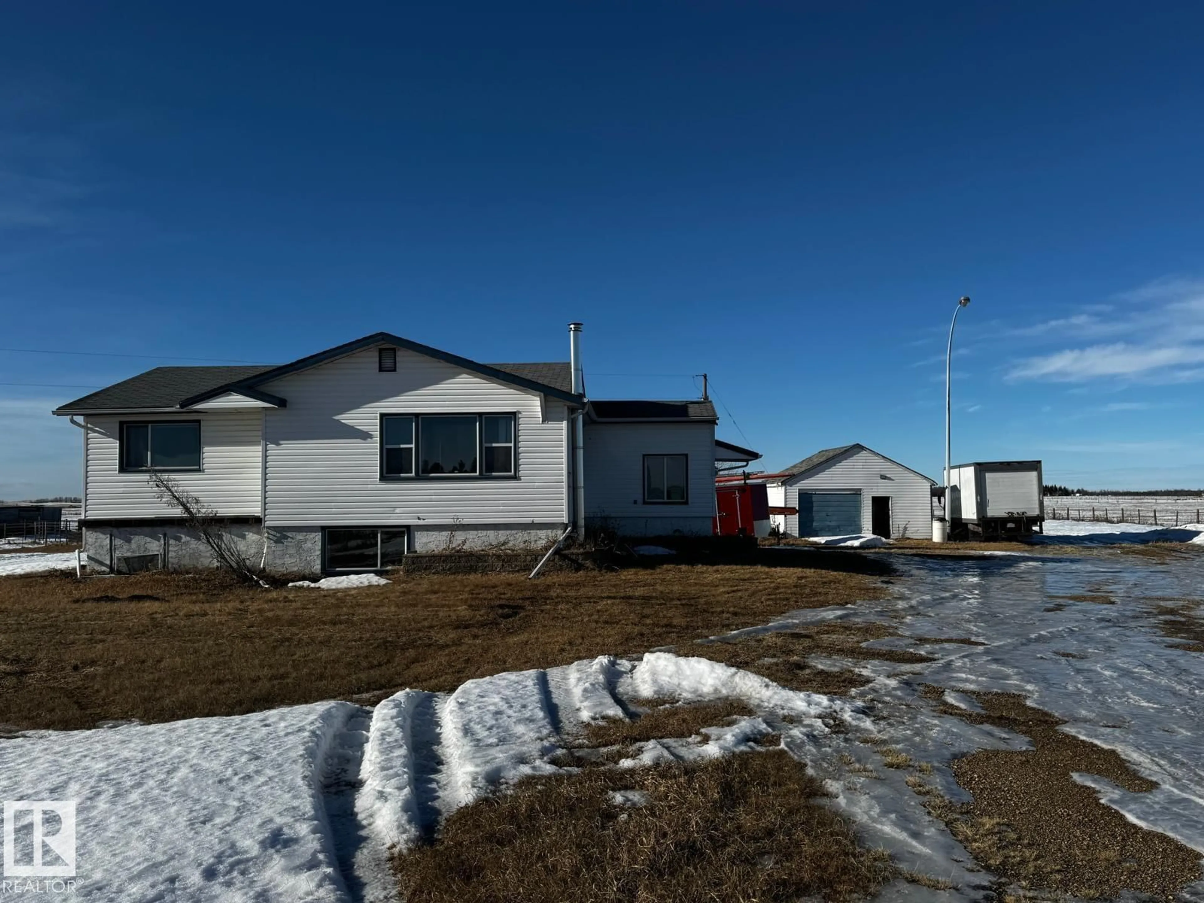 A pic from outside/outdoor area/front of a property/back of a property/a pic from drone, street for 48548 HWY 2 A, Rural Leduc County Alberta T4X2S4
