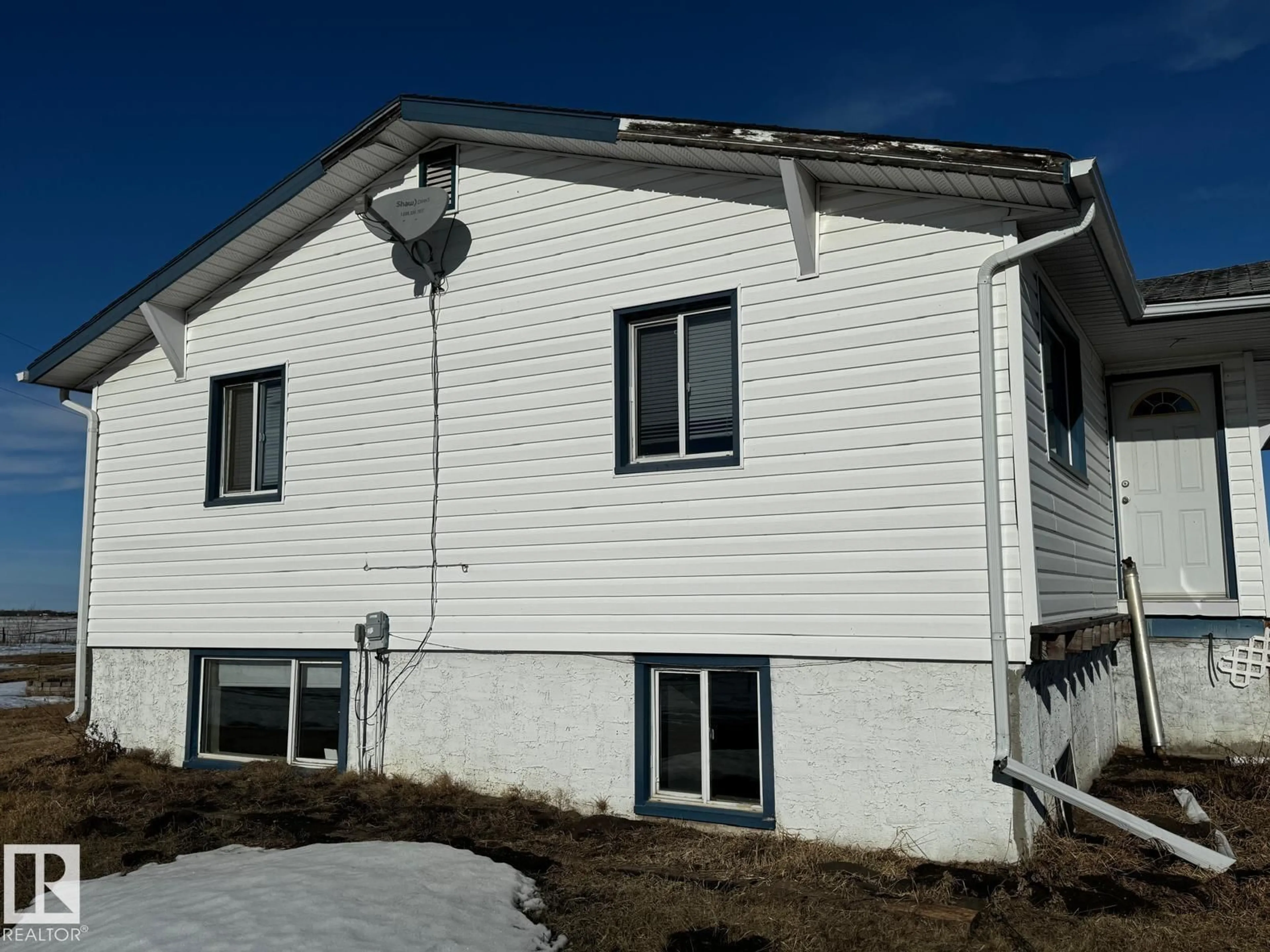 Home with vinyl exterior material, building for 48548 HWY 2 A, Rural Leduc County Alberta T4X2S4