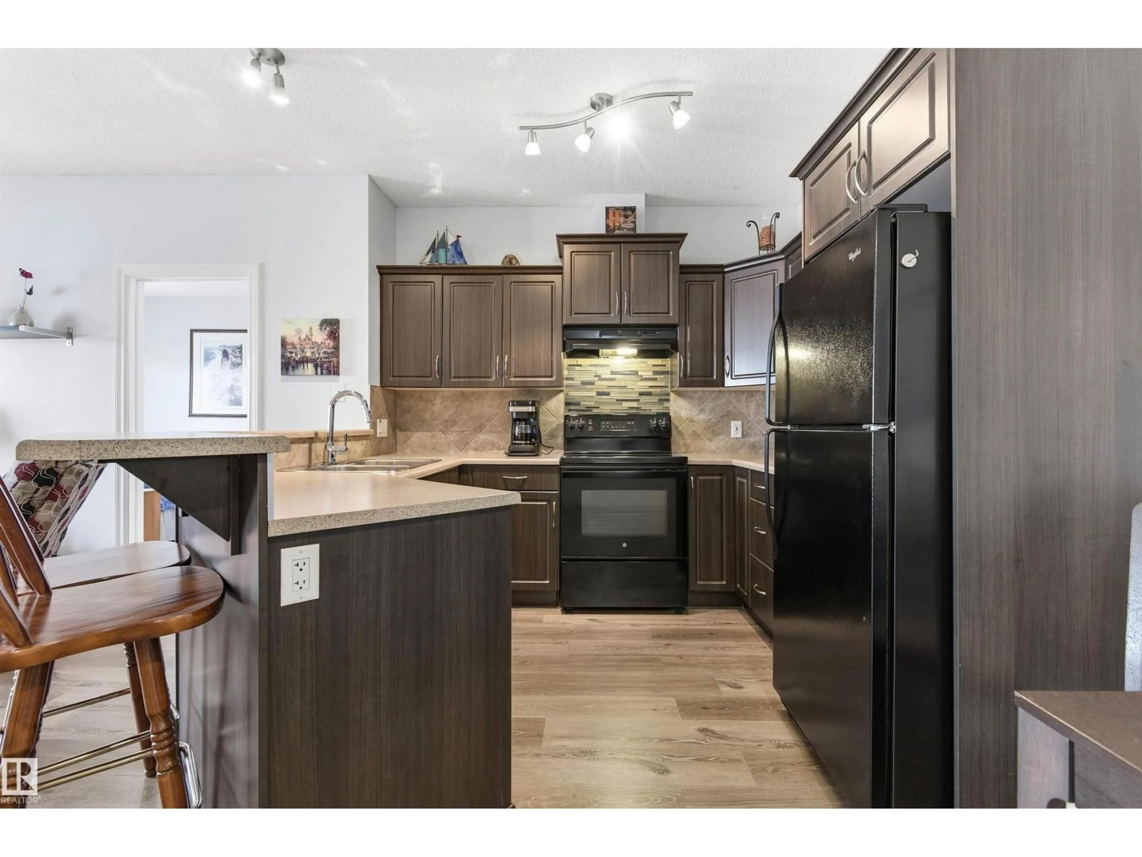Open concept kitchen, unknown for #313 - 263 MACEWAN RD, Edmonton Alberta T6W0C4