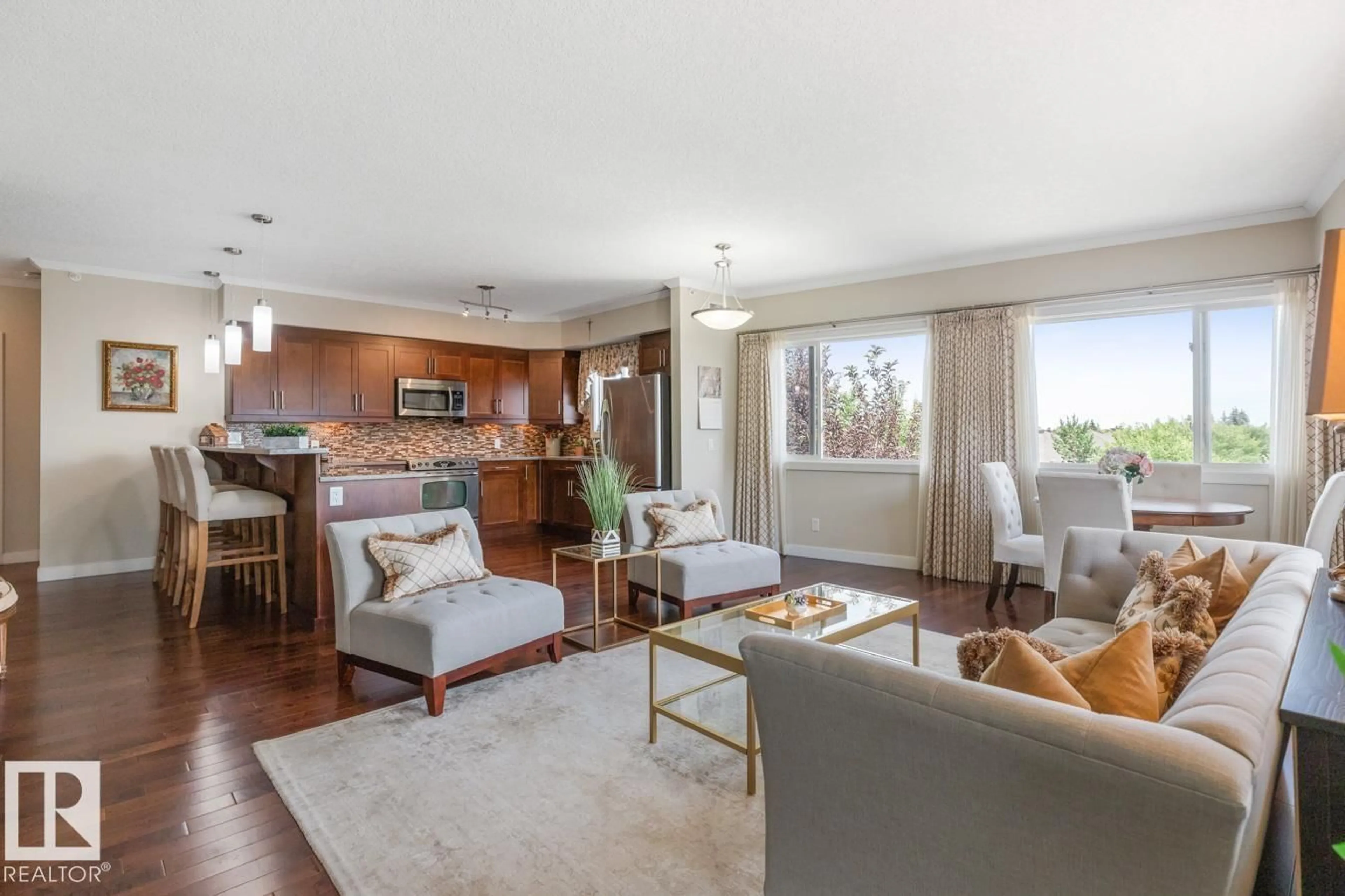 Living room with furniture, wood/laminate floor for 308 CRYSTAL LN, Sherwood Park Alberta T8H0P2