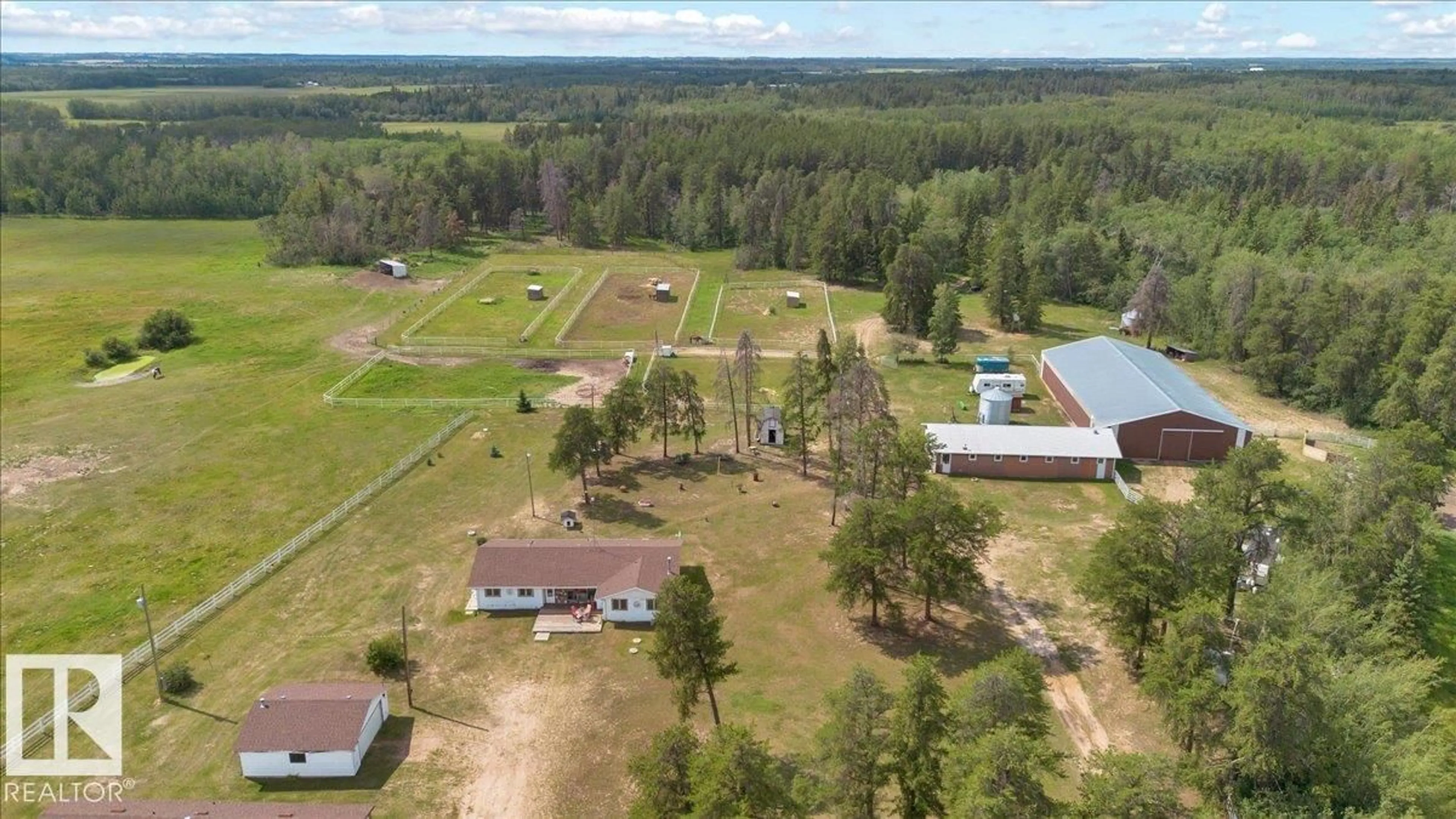 A pic from outside/outdoor area/front of a property/back of a property/a pic from drone, unknown for 57128 RGE ROAD 225, Rural Sturgeon County Alberta T0A1N5