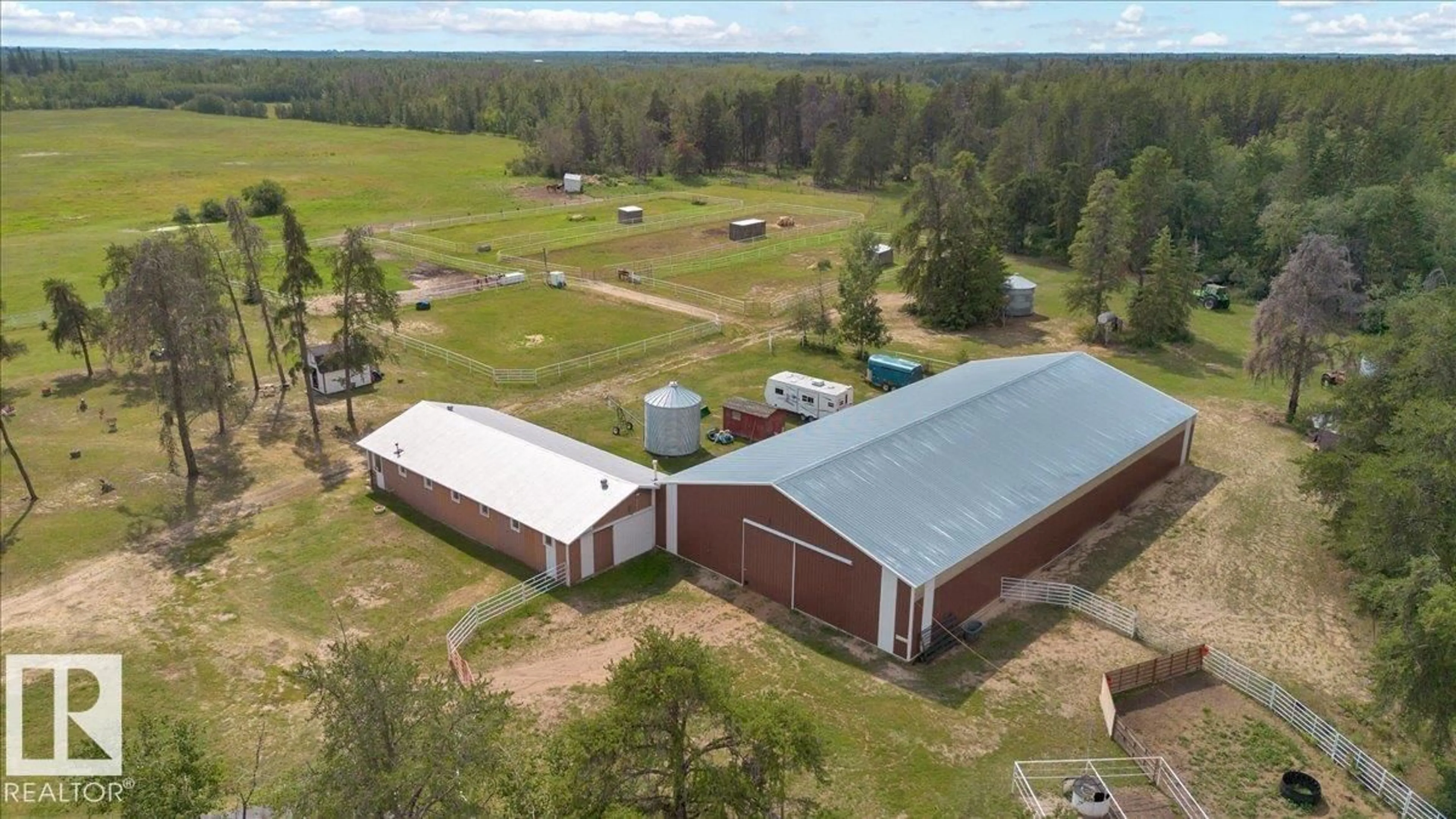 A pic from outside/outdoor area/front of a property/back of a property/a pic from drone, building for 57128 RGE ROAD 225, Rural Sturgeon County Alberta T0A1N5