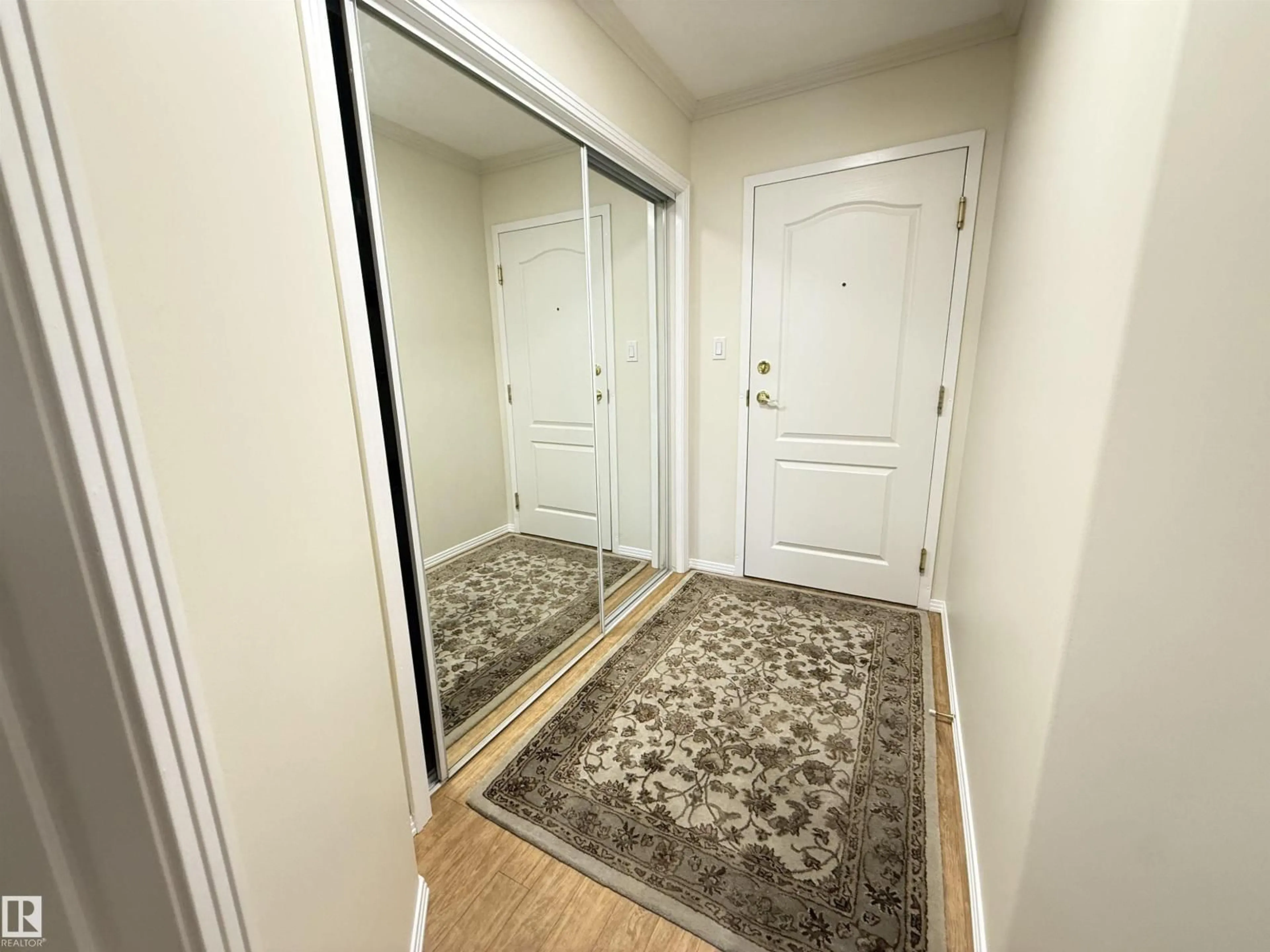 Indoor entryway for 302 - 8215 84 AV, Edmonton Alberta T6C4R2